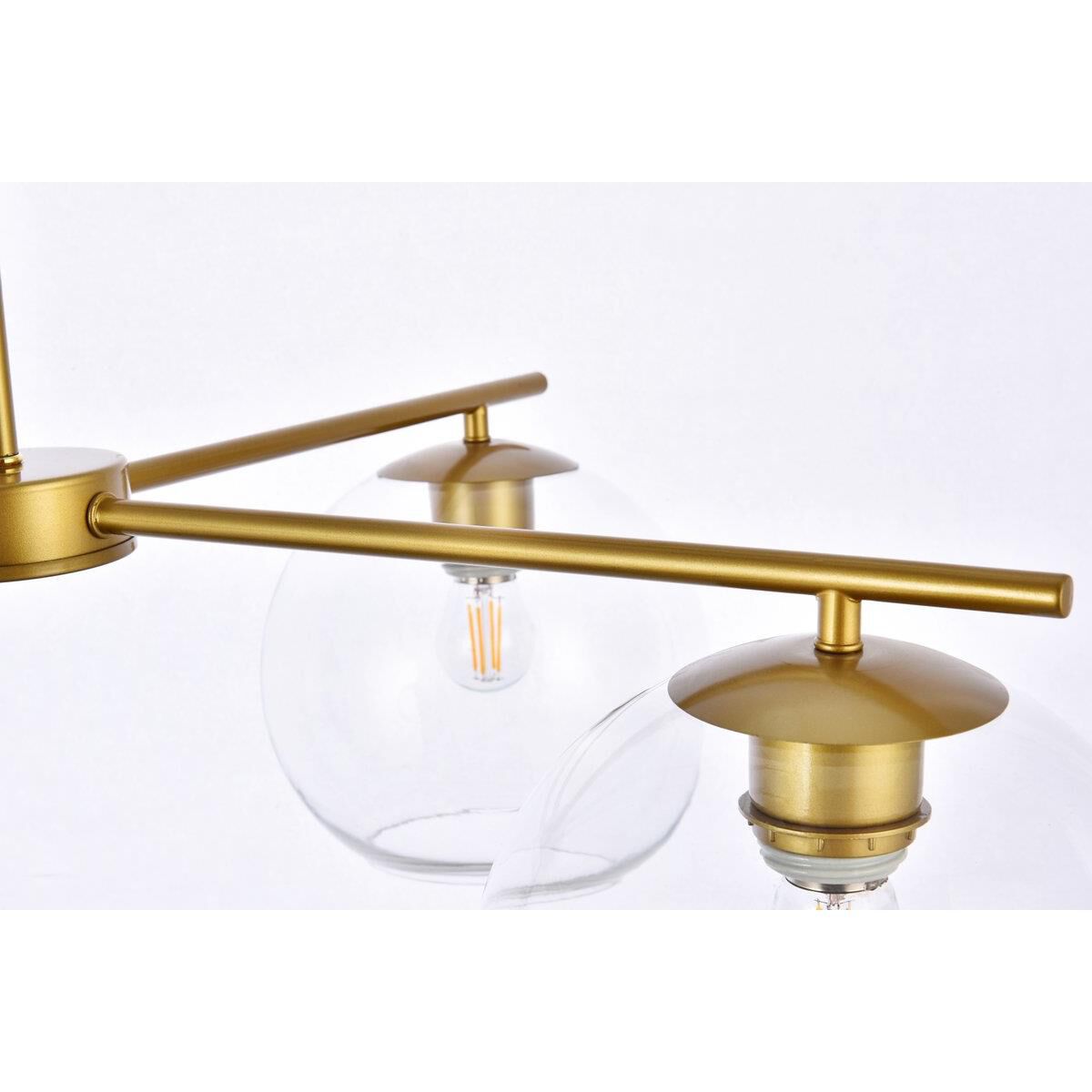Shown in Brass finish and Clear glass