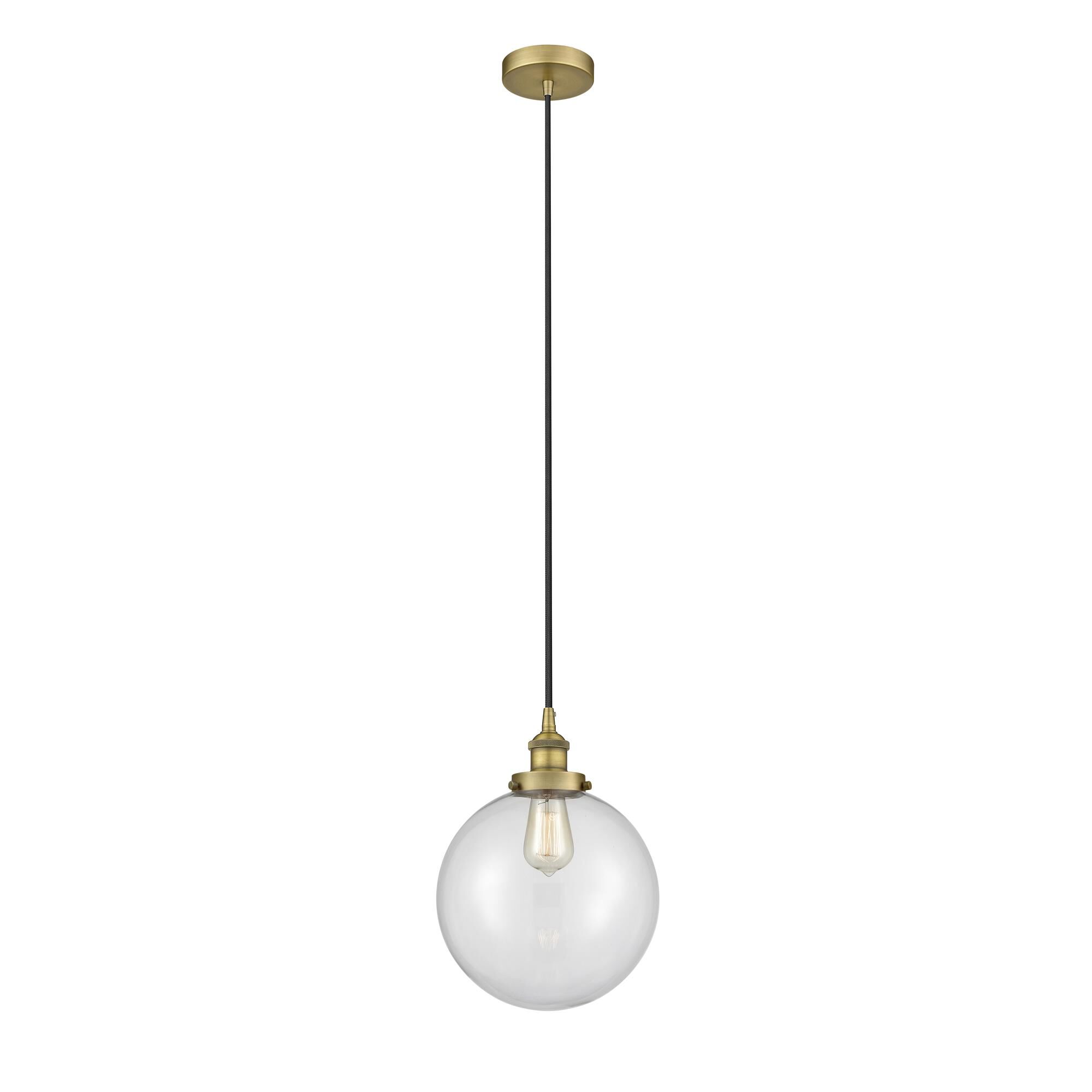 Shown in Brushed Brass finish and Clear Beacon glass