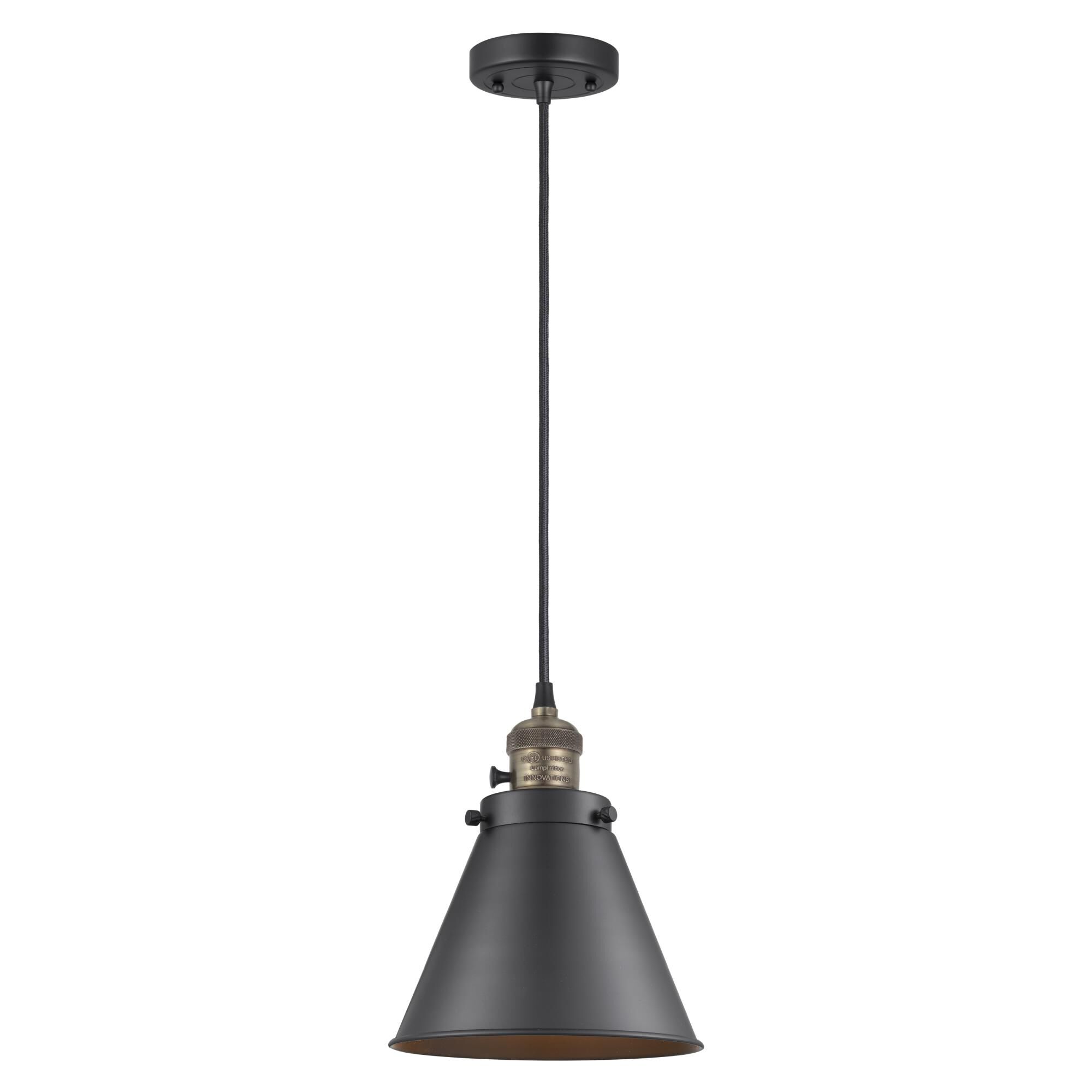 Shown in Black Antique Brass finish and Matte Black shade
