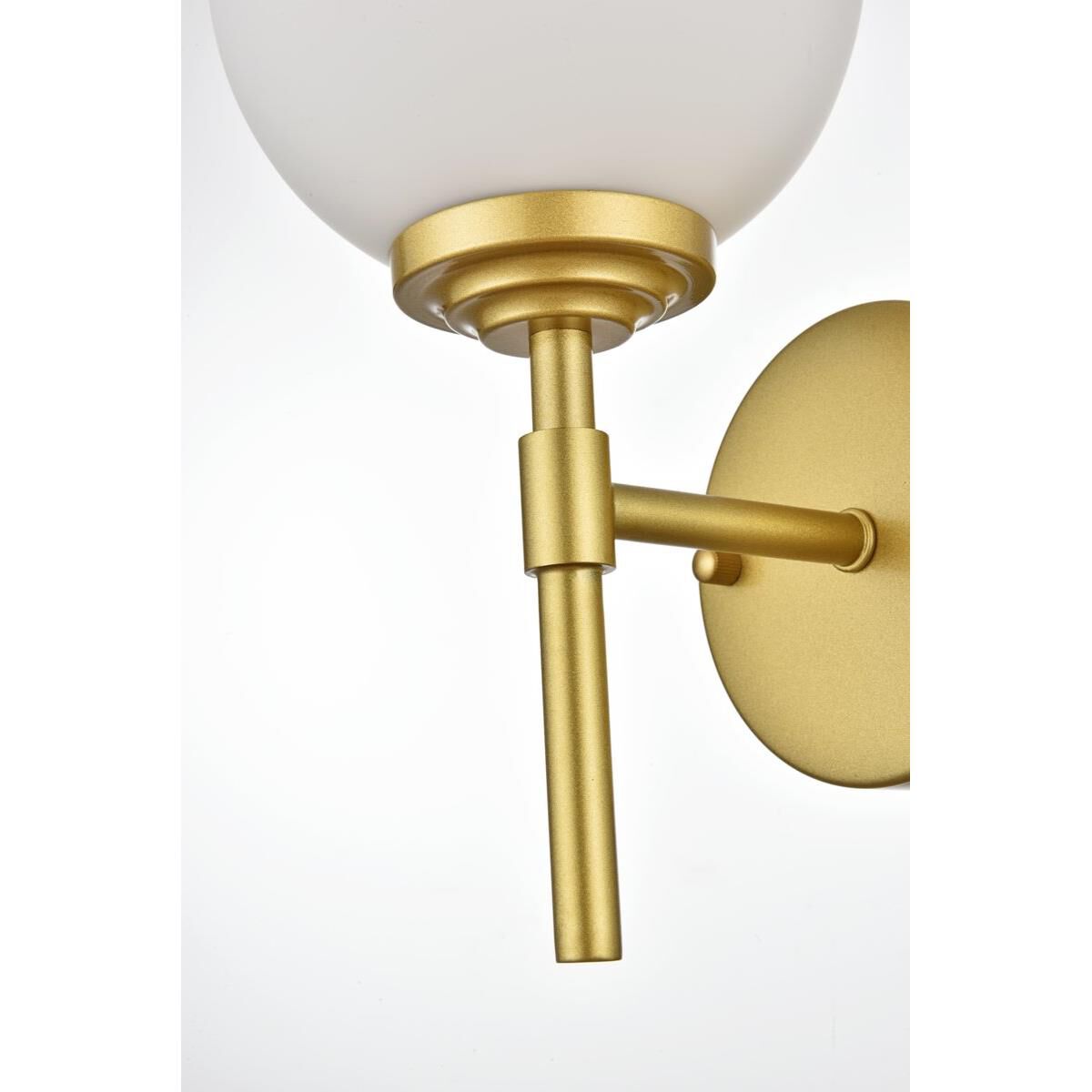 Shown in Brass  finish and Frosted White glass