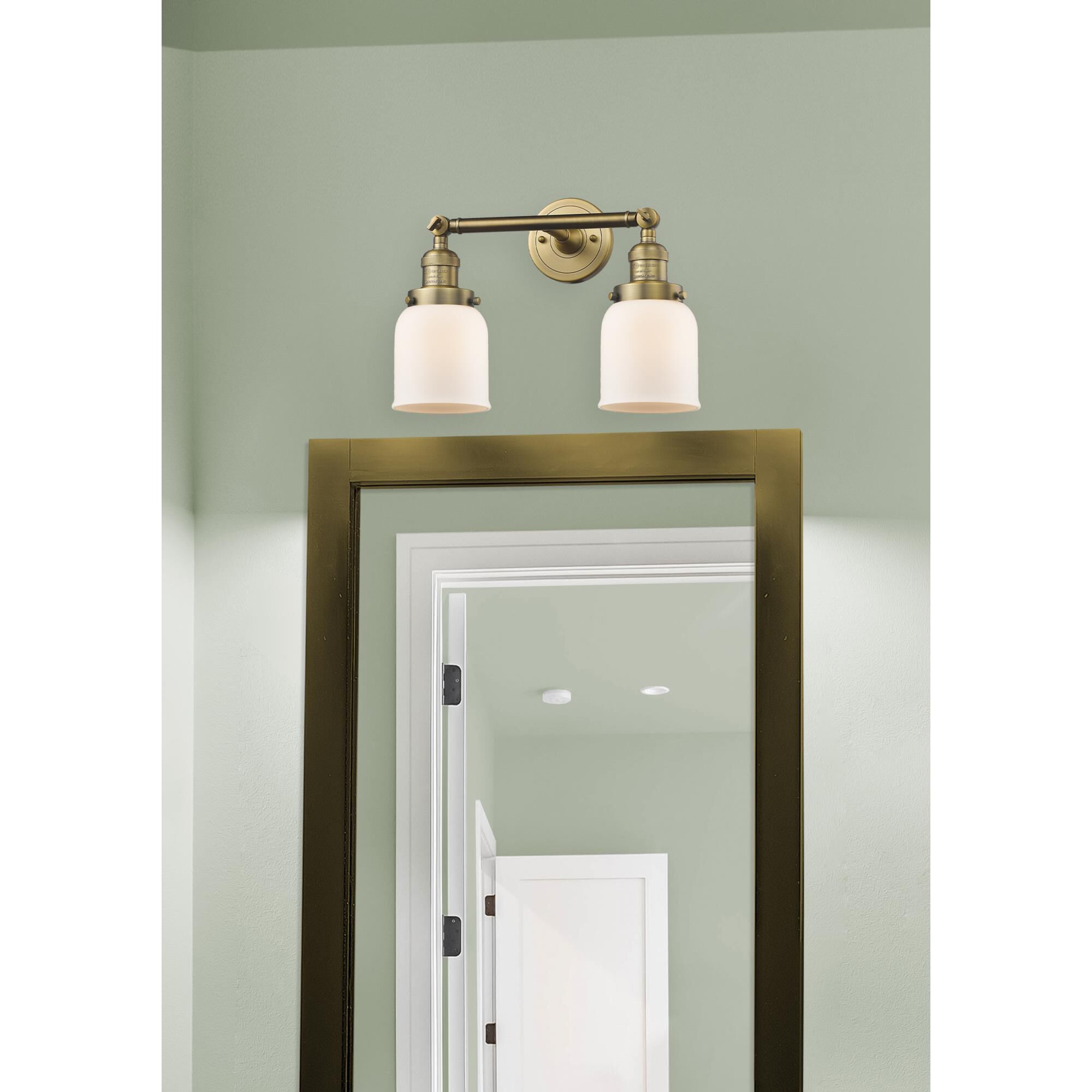 Shown in Brushed Brass finish and Matte White Cased glass