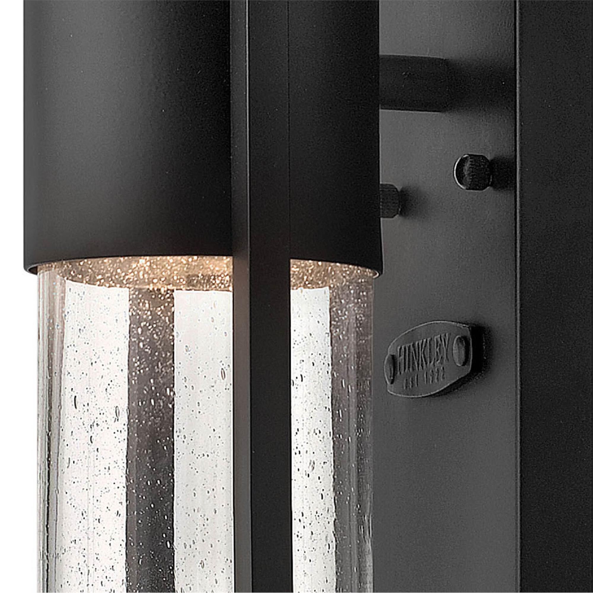 Shown in Black finish and Clear Seedy glass