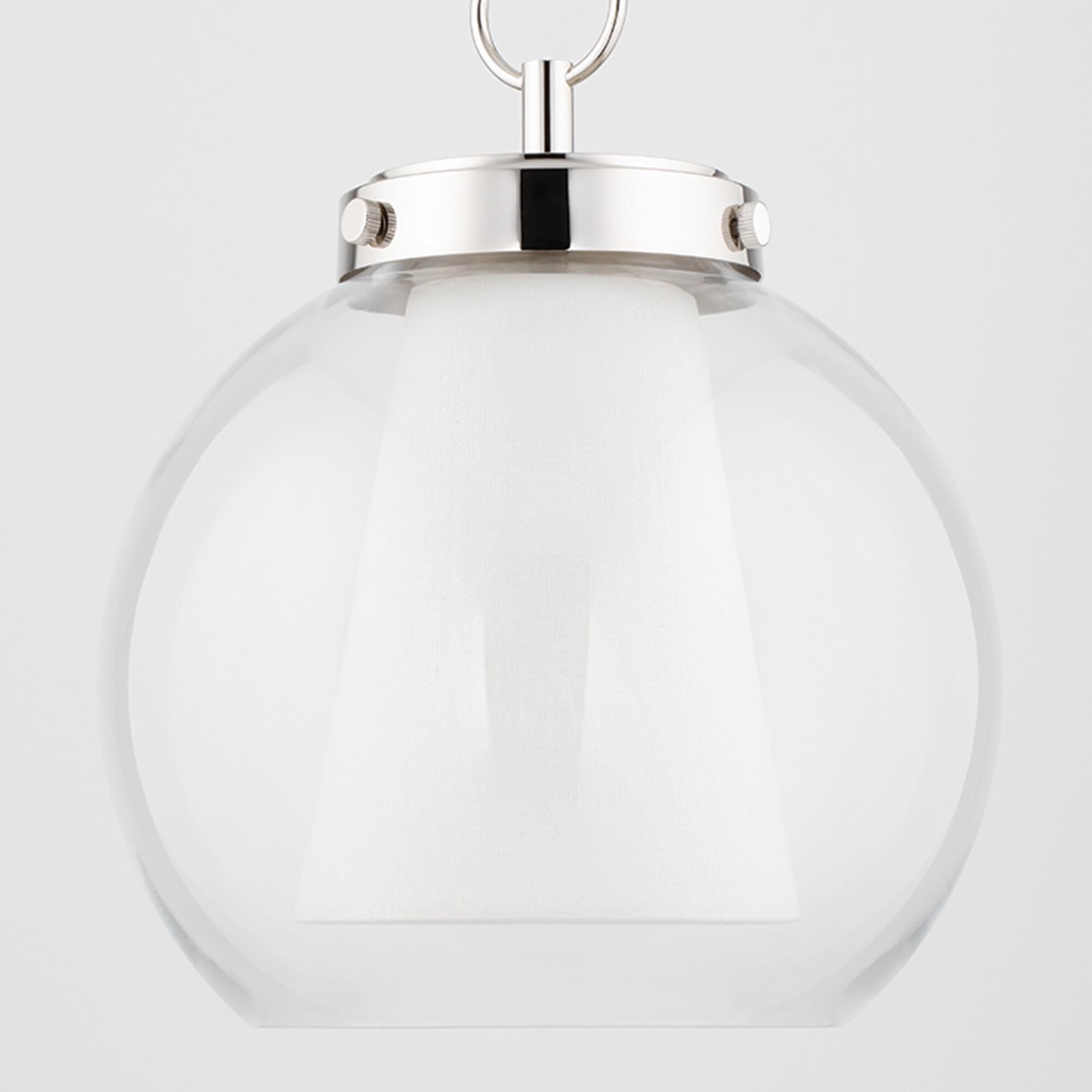 Shown in Polished Nickel finish and Clear glass and White Belgian Linen shade