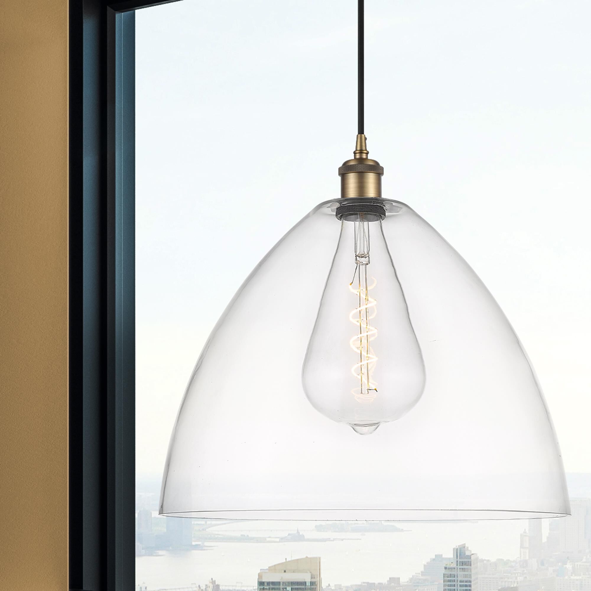 Shown in Brushed Brass finish and Cased Matte White glass