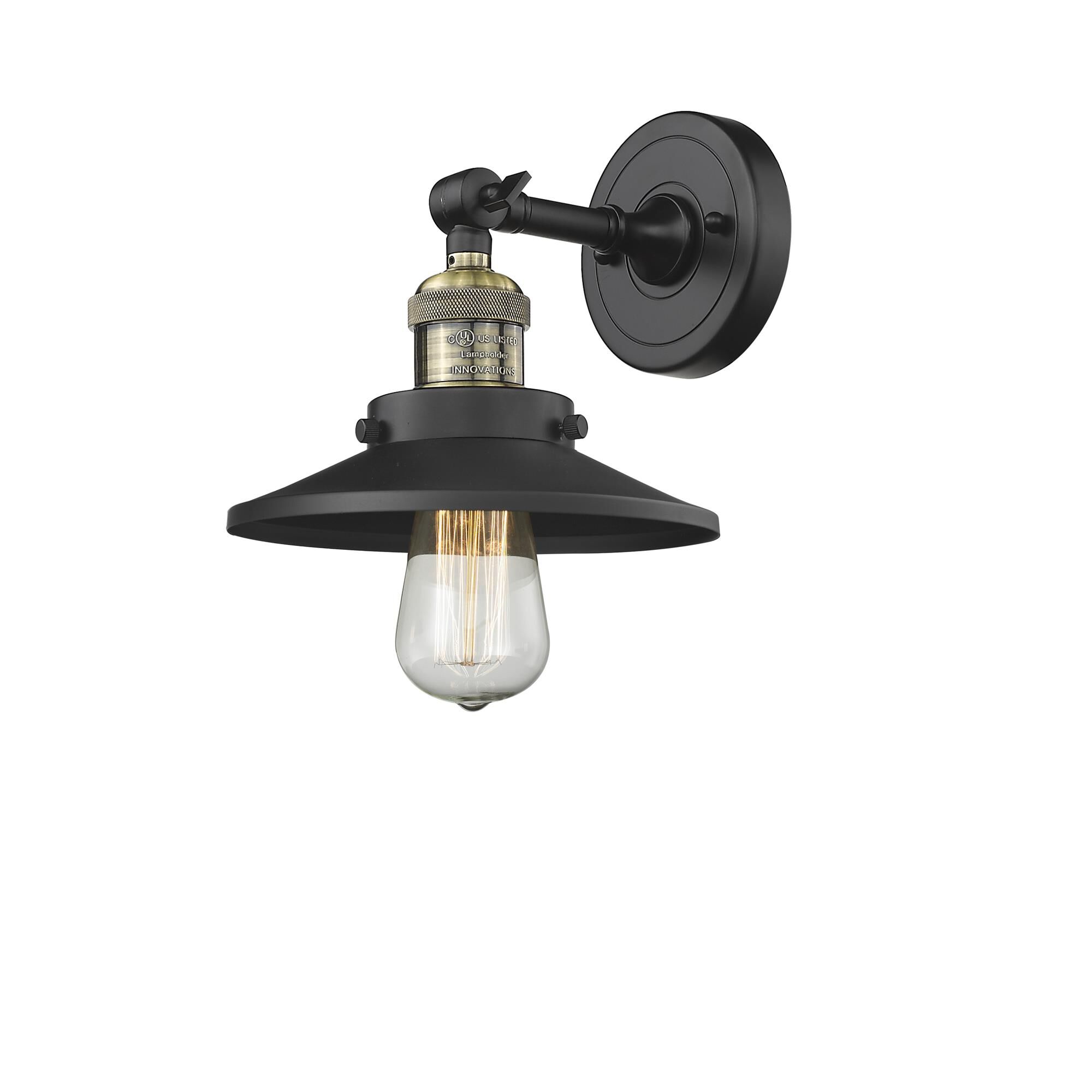 Shown in Black Antique Brass finish and Matte Black shade