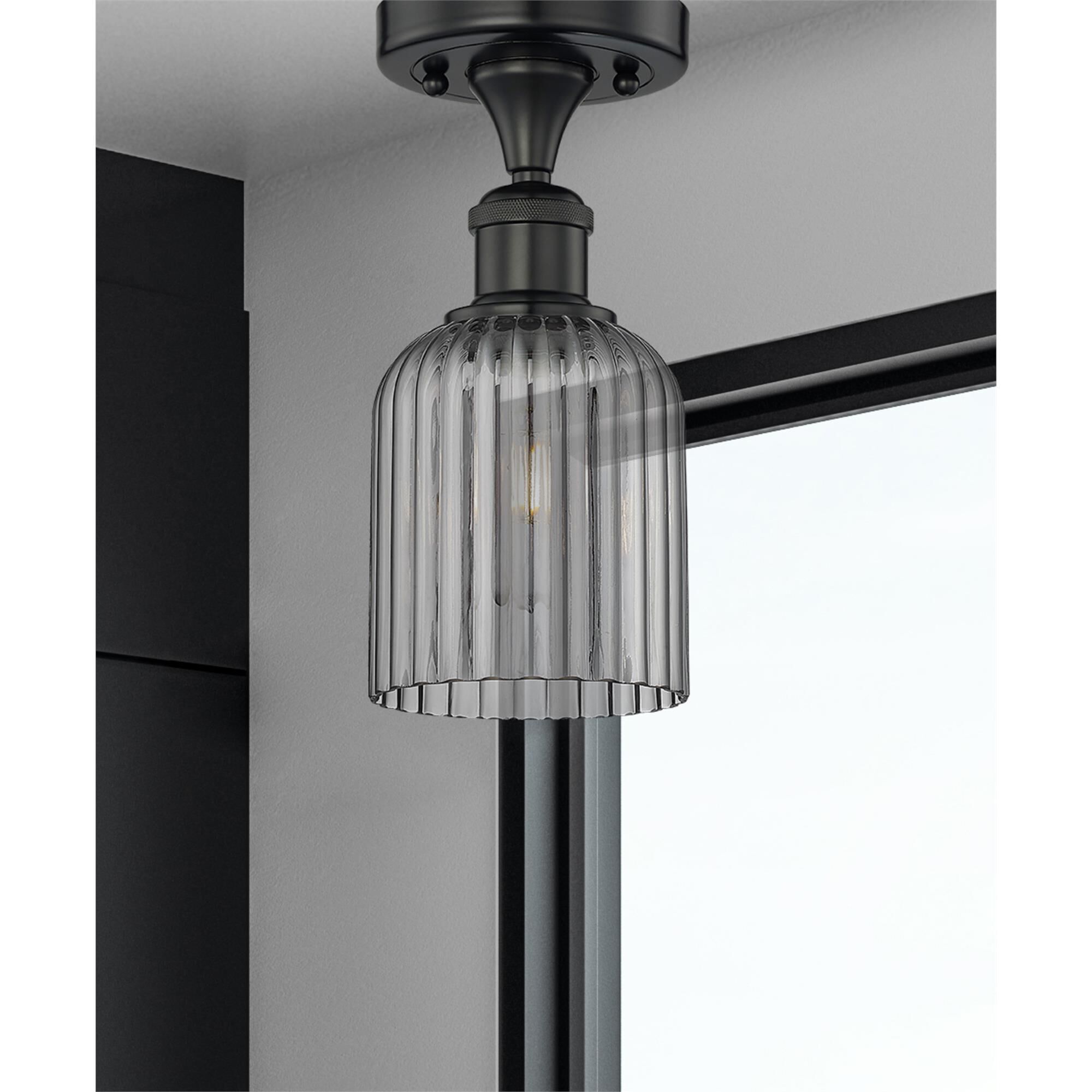 Shown in Matte Black finish and Light Smoke glass