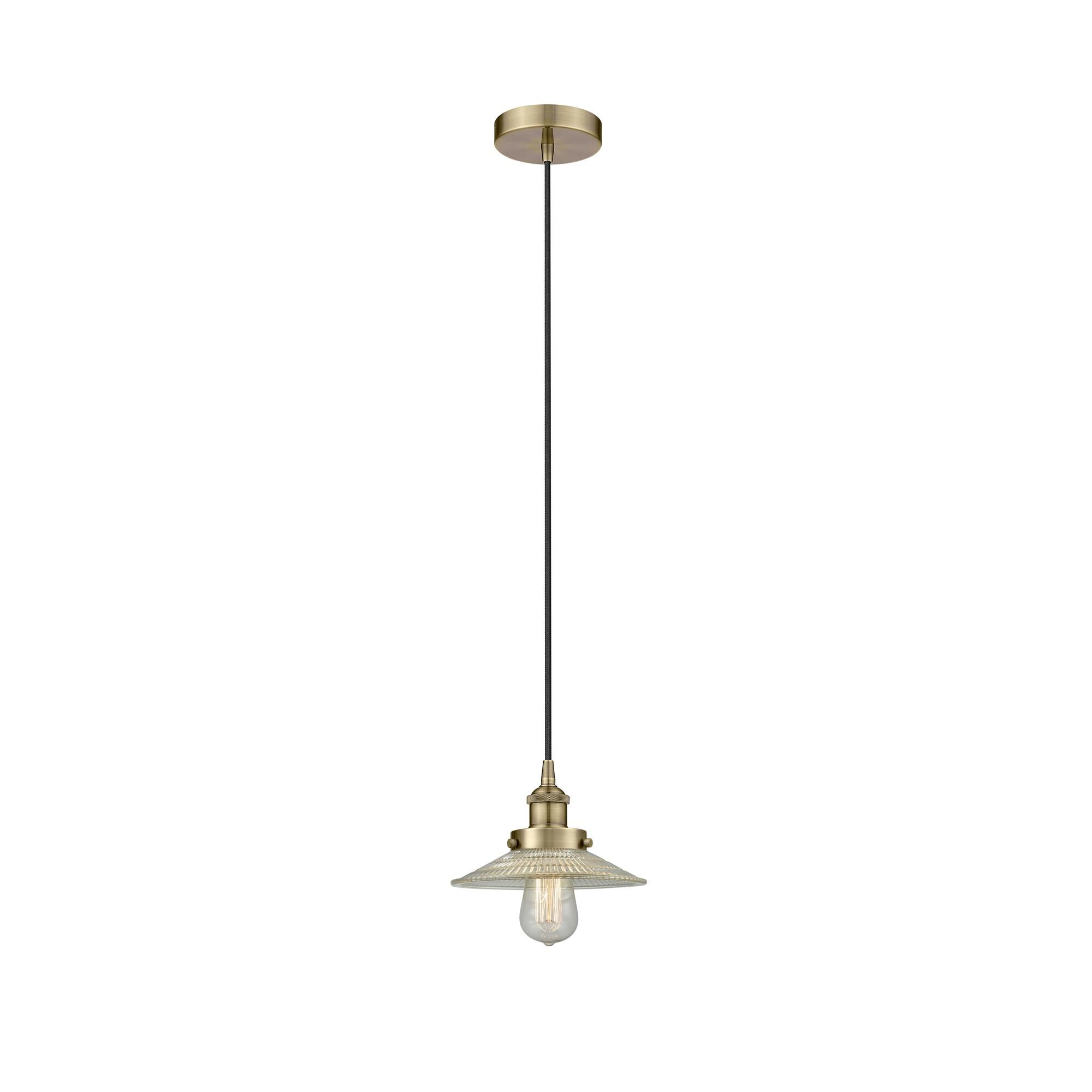 Shown in Antique Brass finish and Clear glass