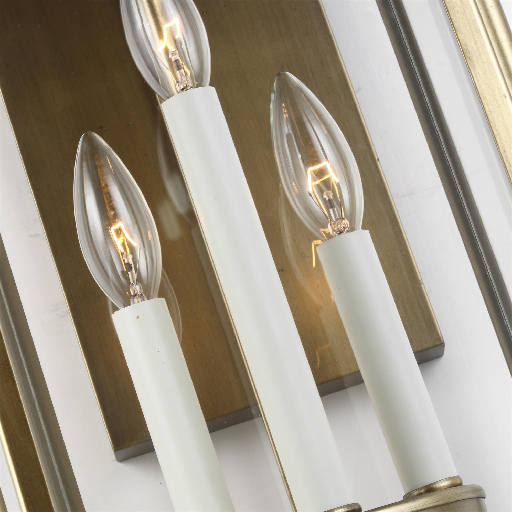 Shown in Painted Distressed Brass finish and Clear Panels glass