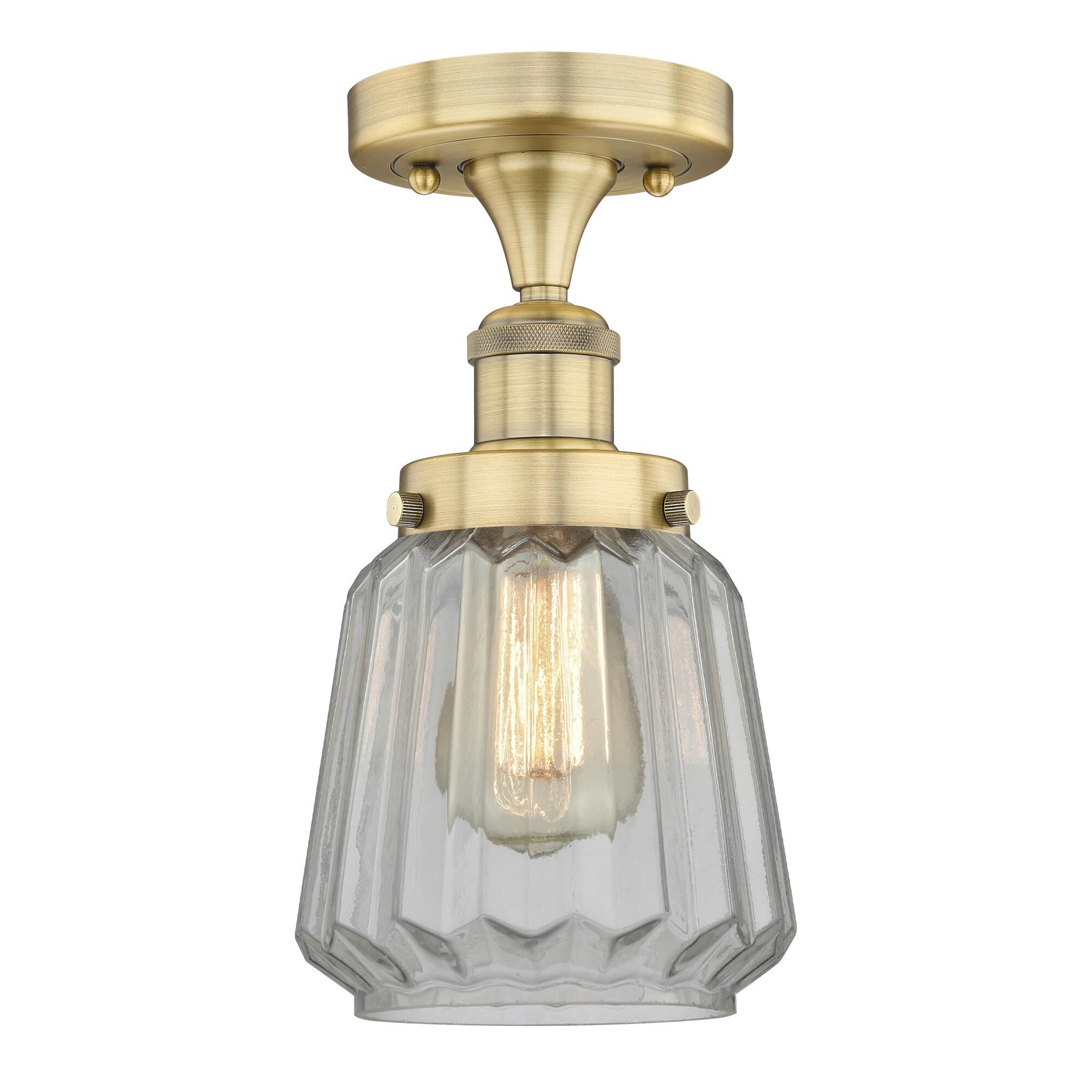 Shown in Brushed Brass finish and Clear glass