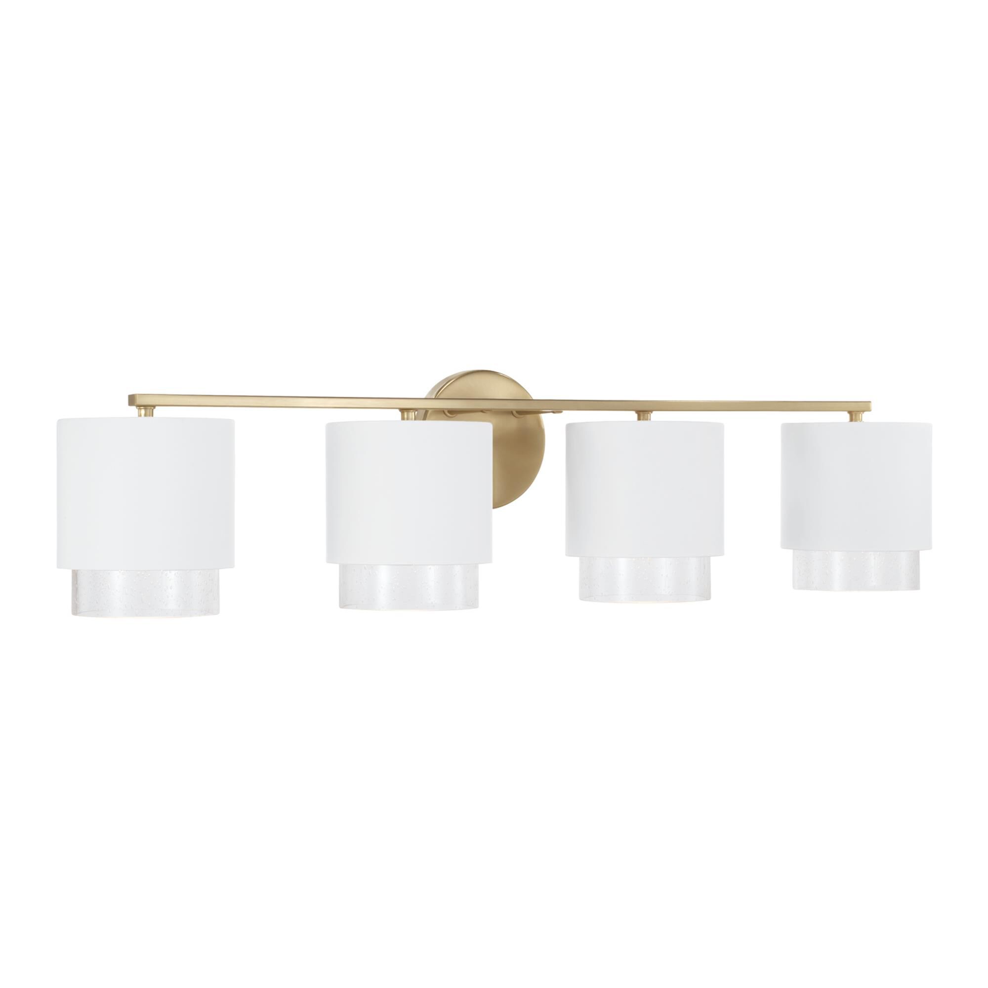 Shown in Matte Brass and White finish and Clear Seeded glass and Metal with Brass Interior shade