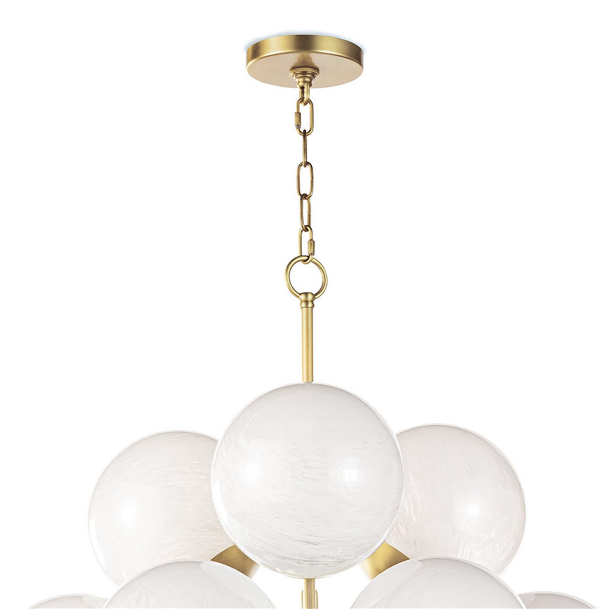 Shown in Natural Brass finish and Swirl glass