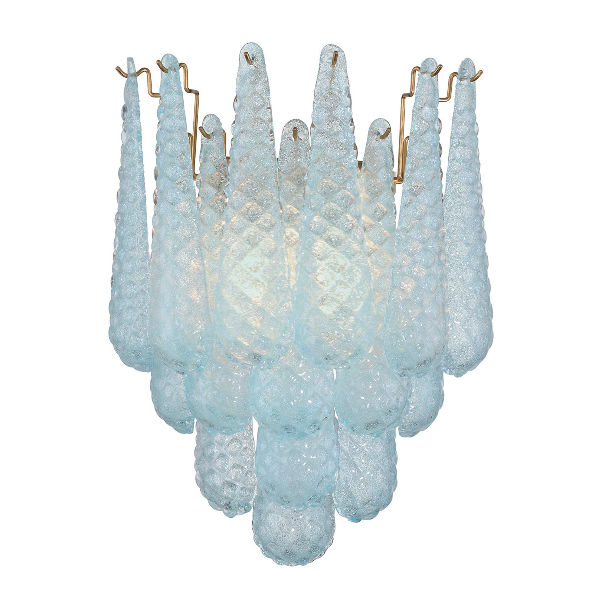 Shown in Aged Brass finish and Sand Blue glass