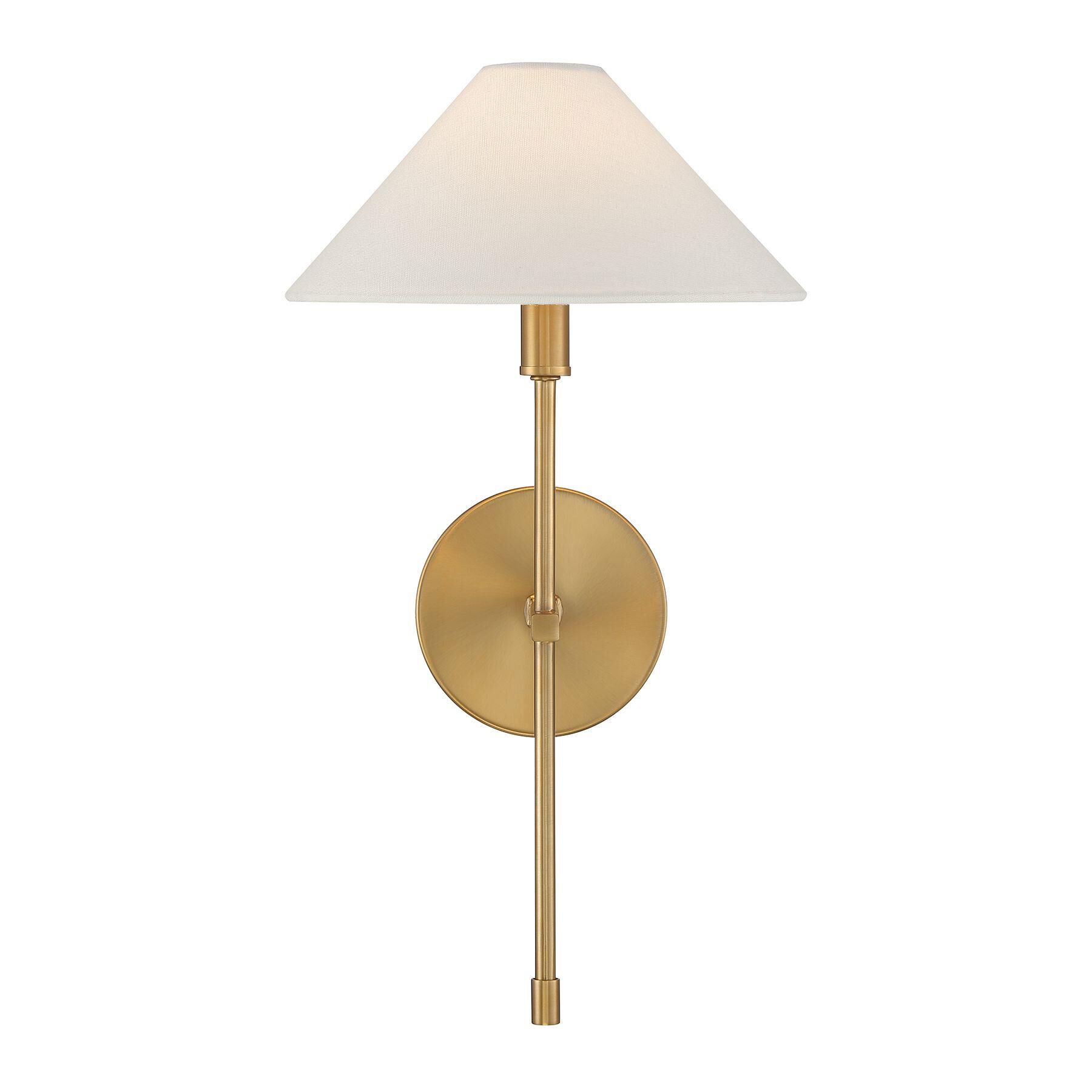 Shown in Warm Brass finish and White Linen Fabric shade
