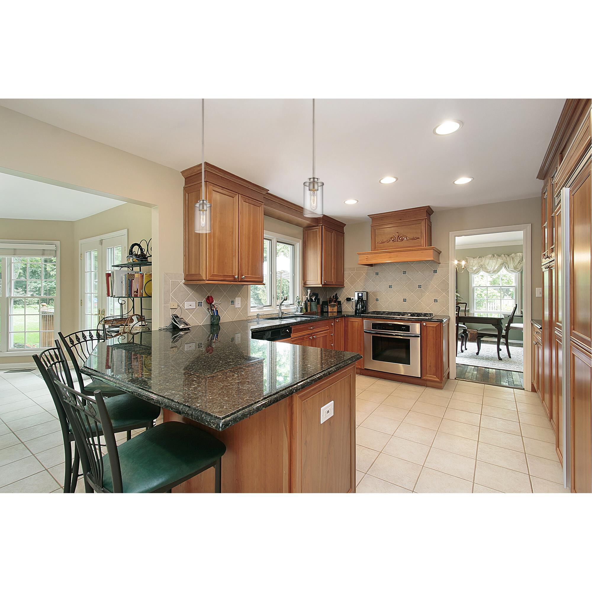 Shown in Brushed Nickel finish and Glass shade