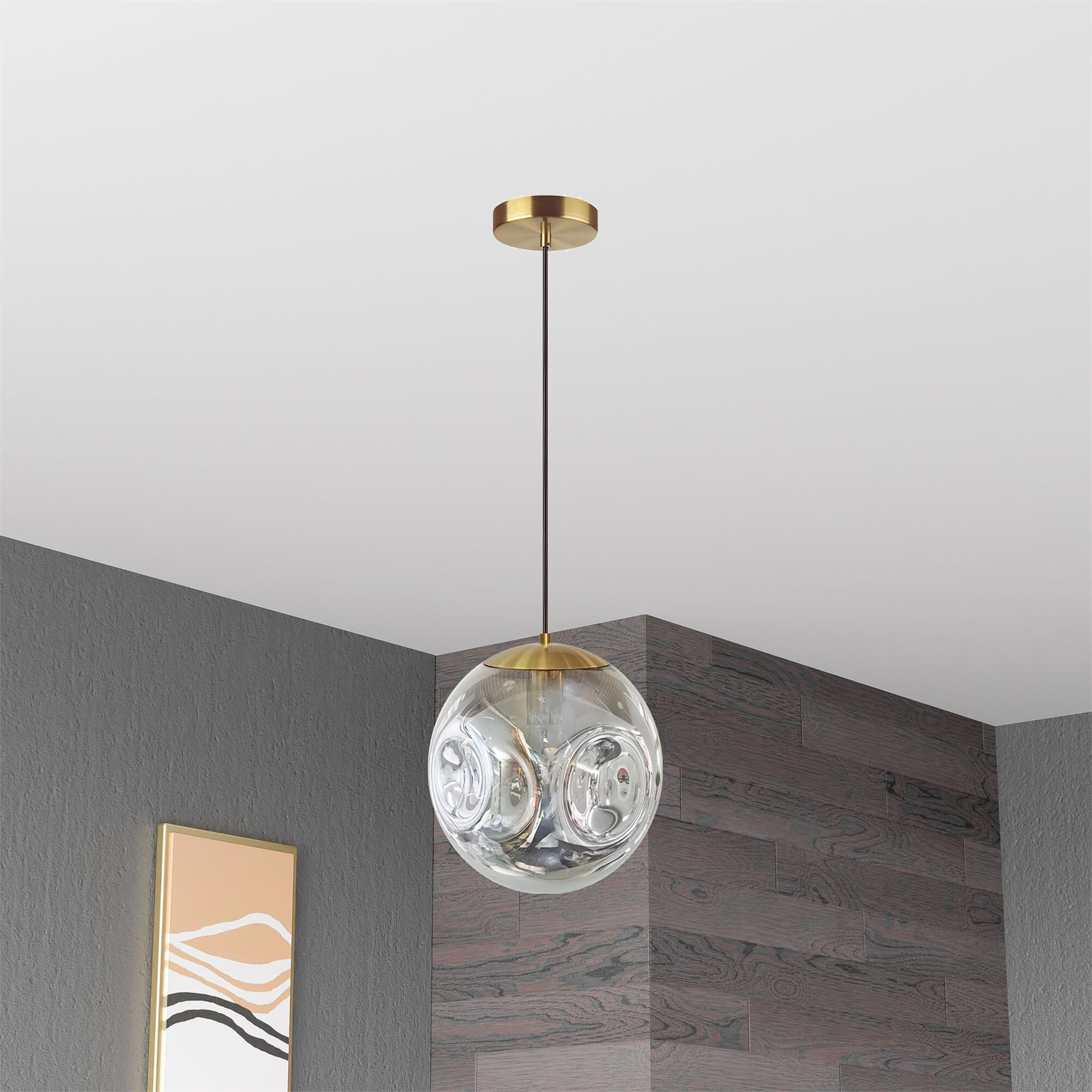 Shown in Smoke and Aged Brass finish and Smoked Globe glass