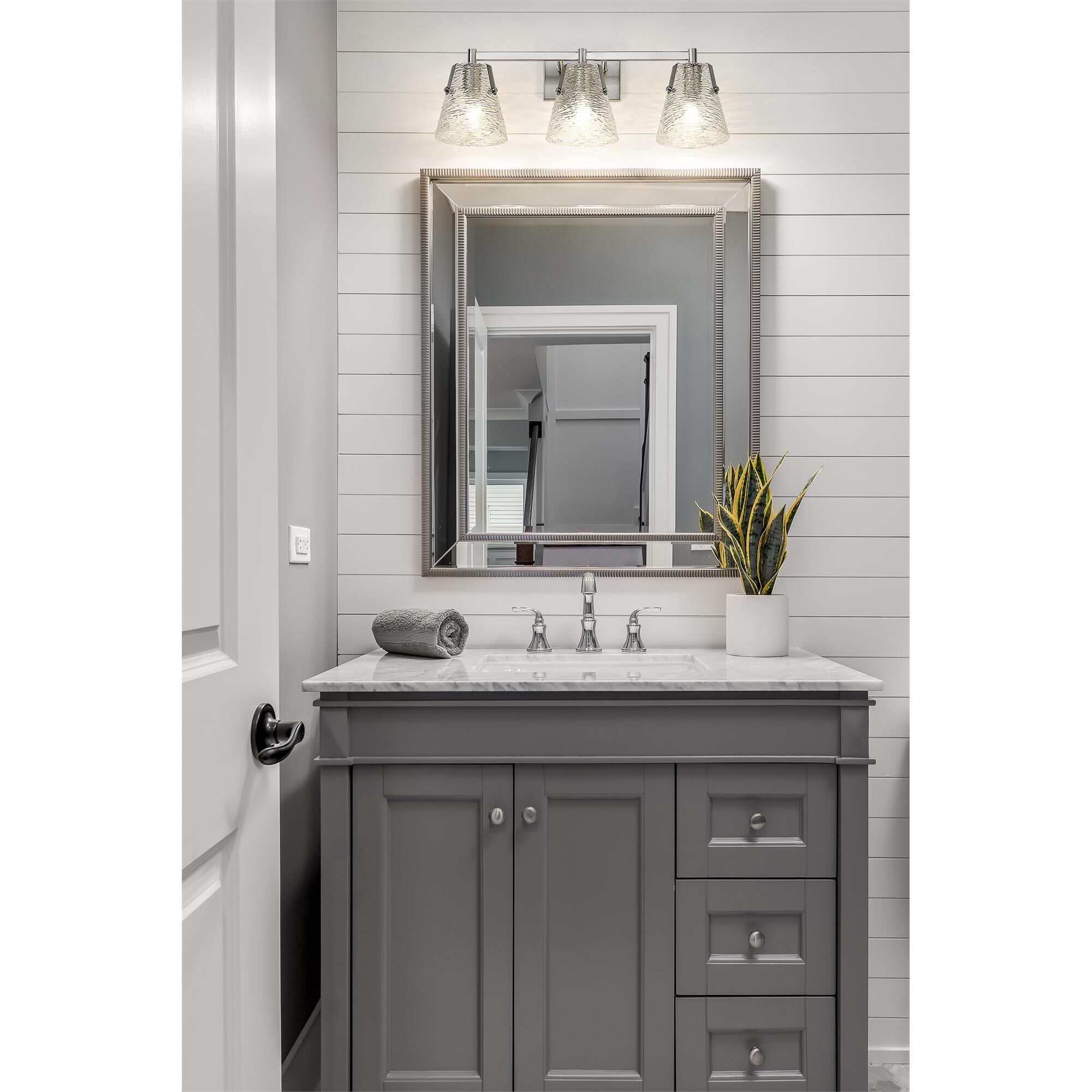 Shown in Brushed Nickel finish and Clear Ribbed glass
