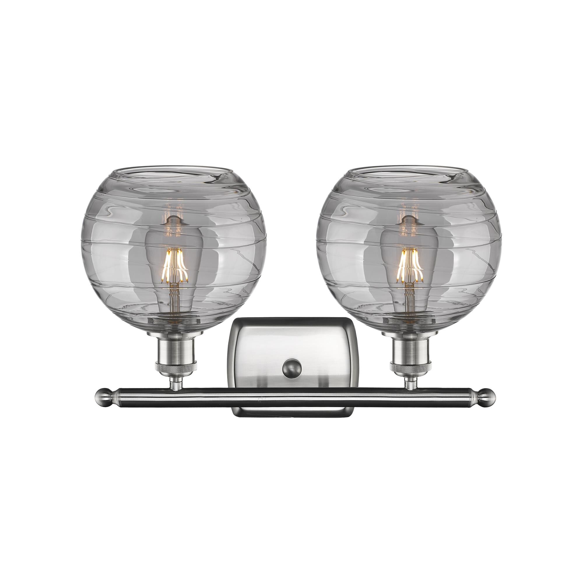 Shown in Brushed Satin Nickel finish and Light Smoke Deco Swirl glass