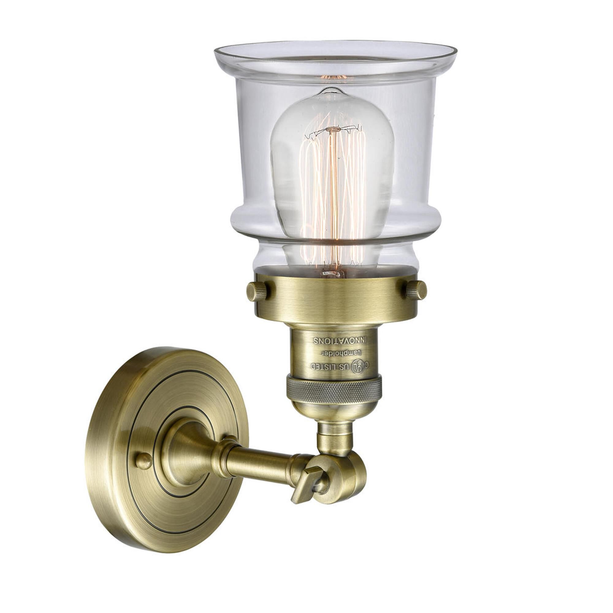 Shown in Antique Brass finish and Clear glass