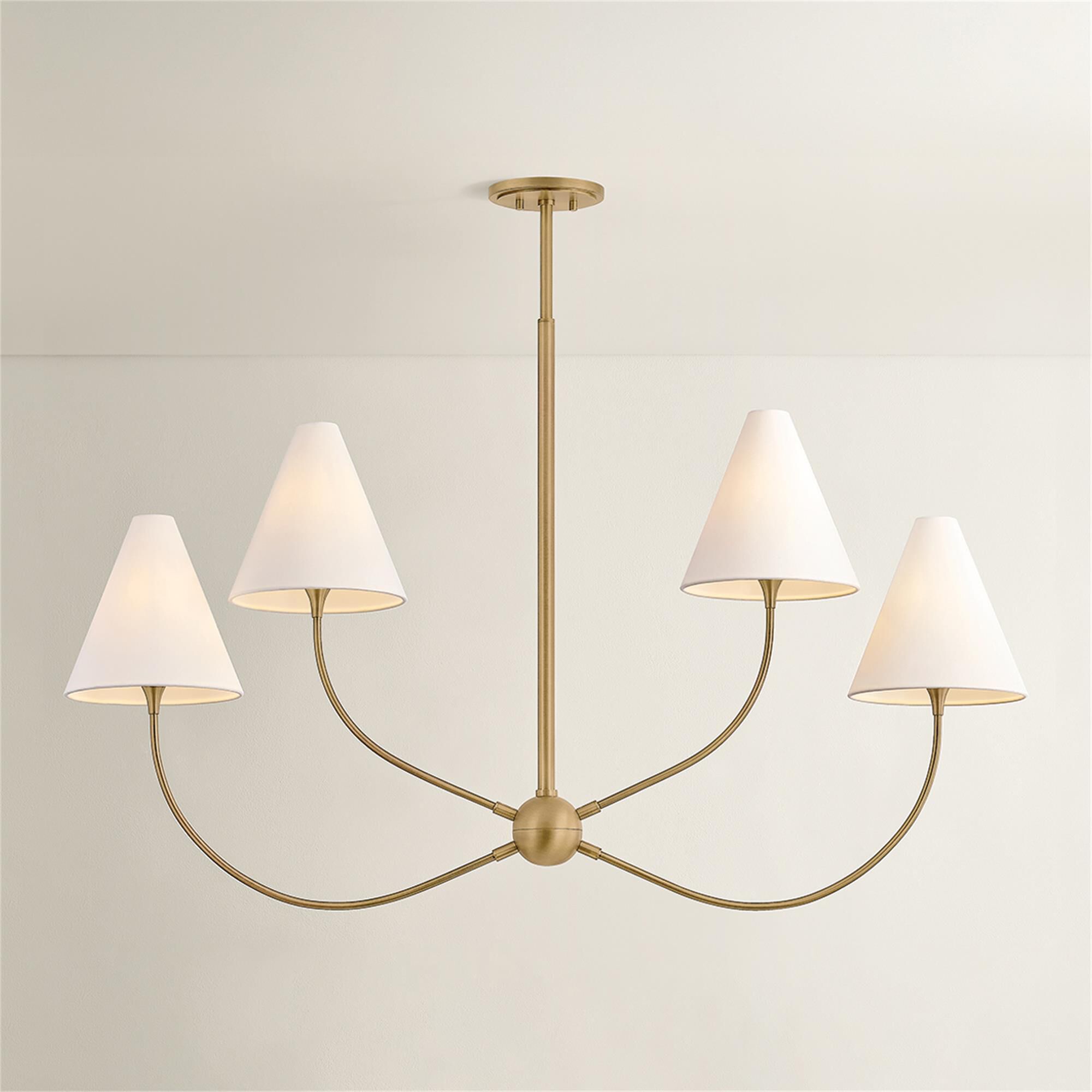 Shown in Patina Brass finish and Off White Linen shade