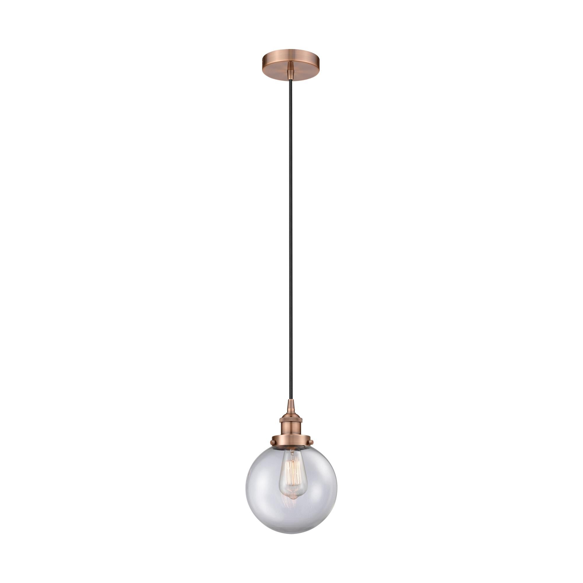 Shown in Antique Copper finish and Clear Beacon glass