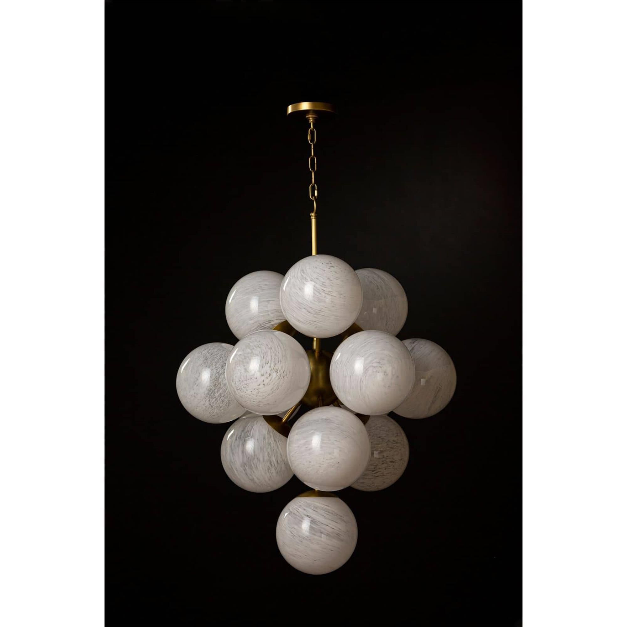Shown in Natural Brass finish and Swirl glass