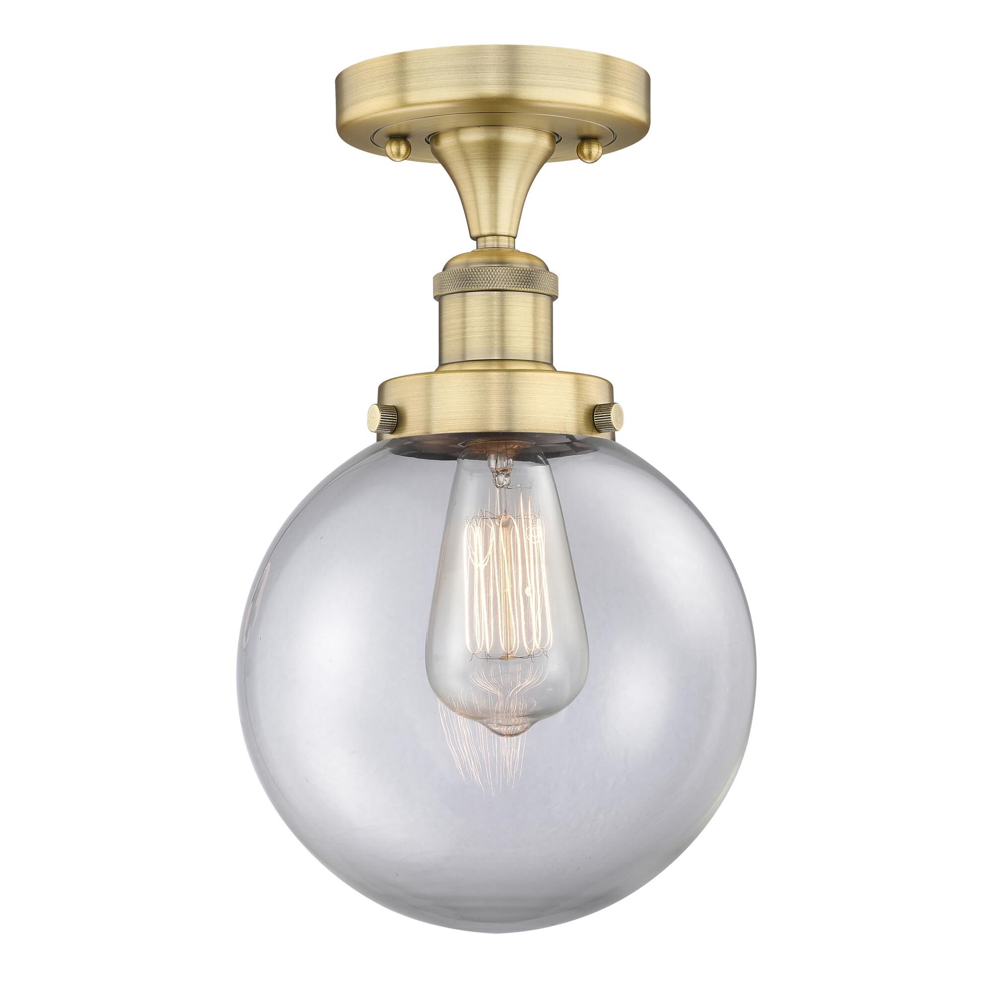 Shown in Brushed Brass finish and Clear glass