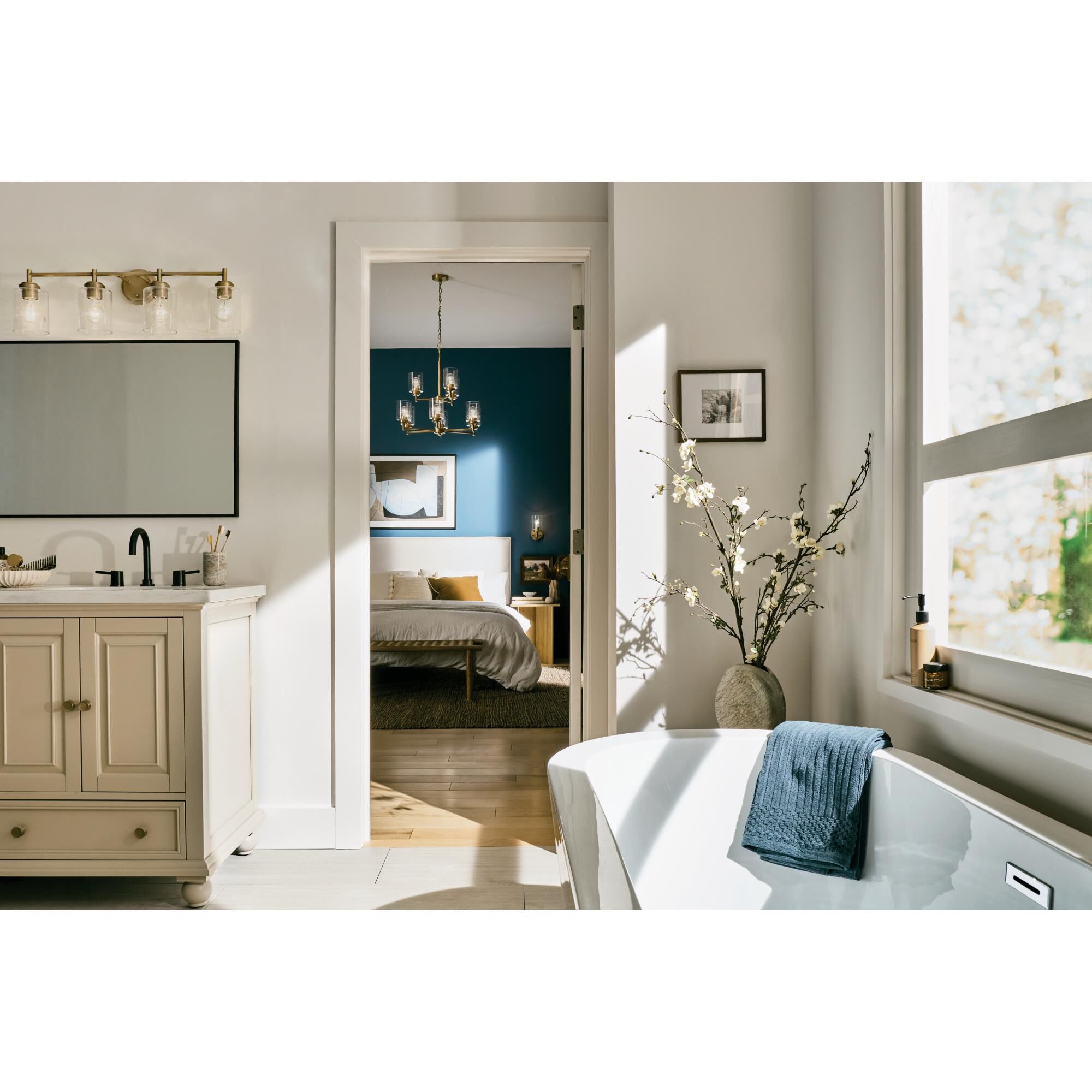 Shown in Natural Brass finish and Clear Seeded glass