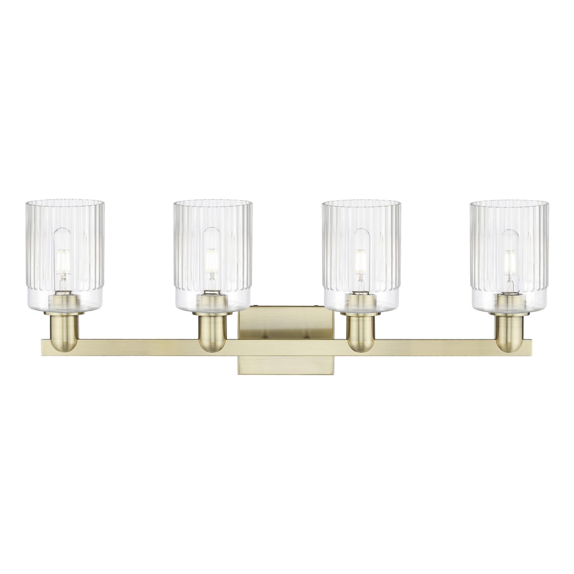 Shown in Antique Brass finish and Clear glass