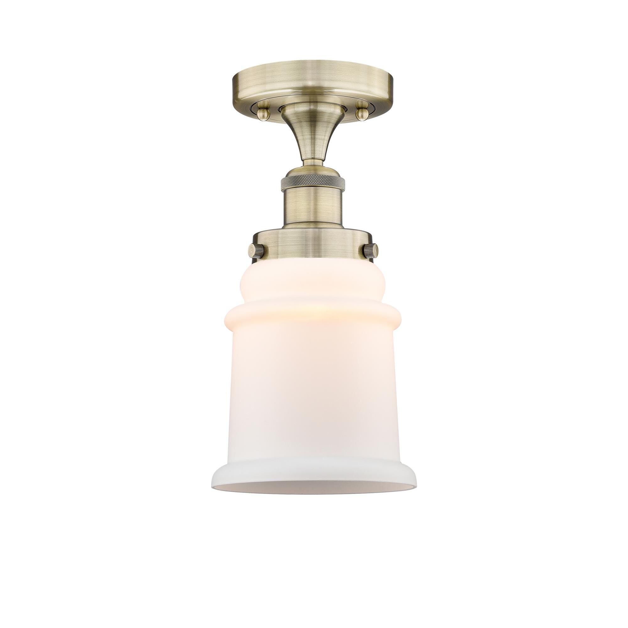 Shown in Antique Brass finish and Matte White glass