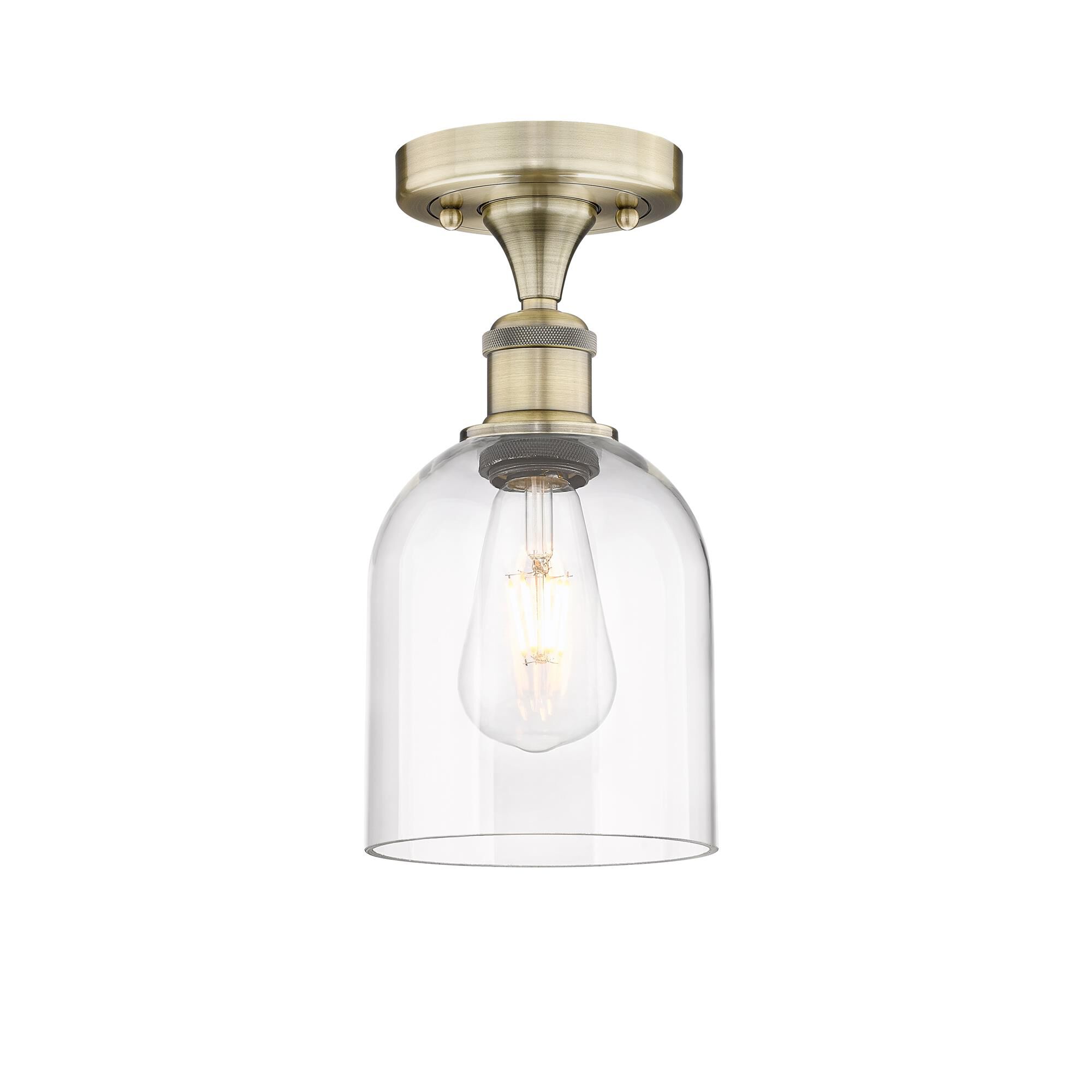 Shown in Antique Brass finish and Clear glass