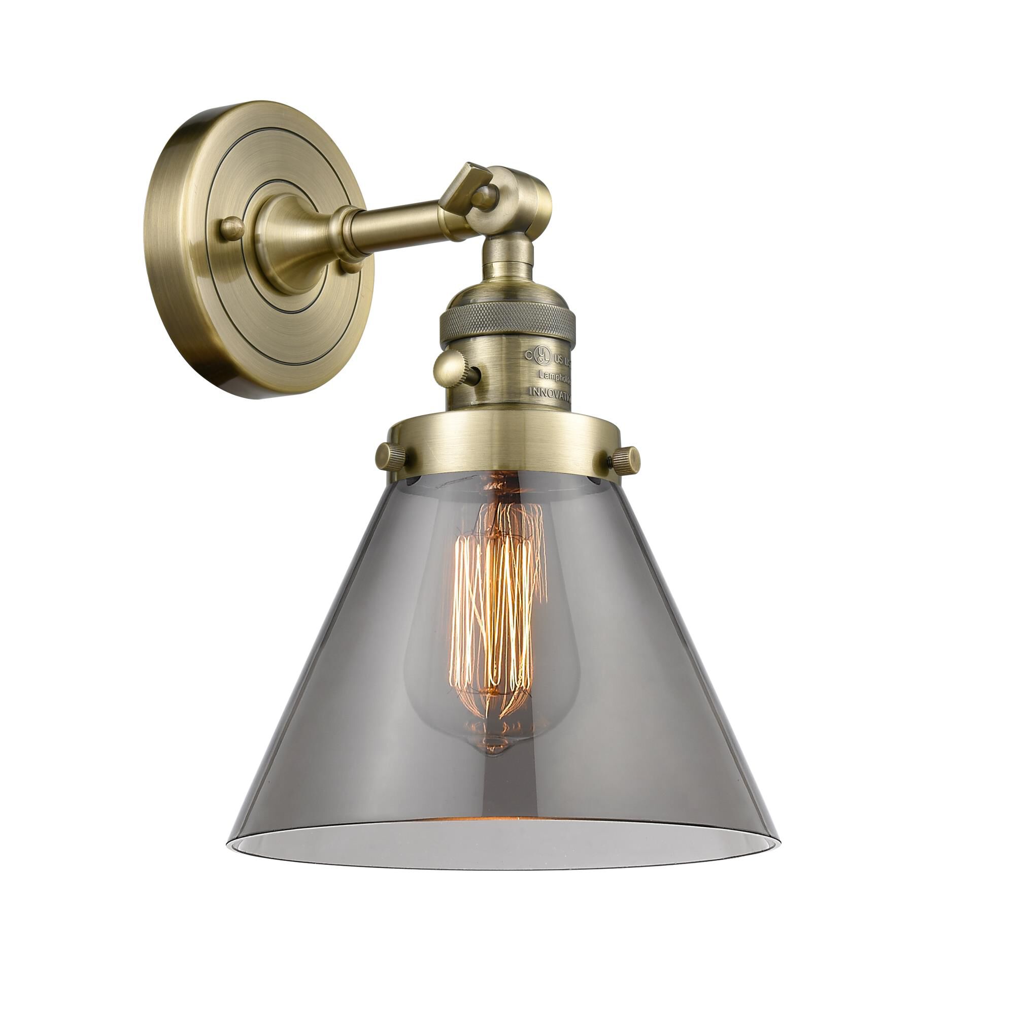 Shown in Antique Brass finish and Smoked glass and Switch on Socket accent