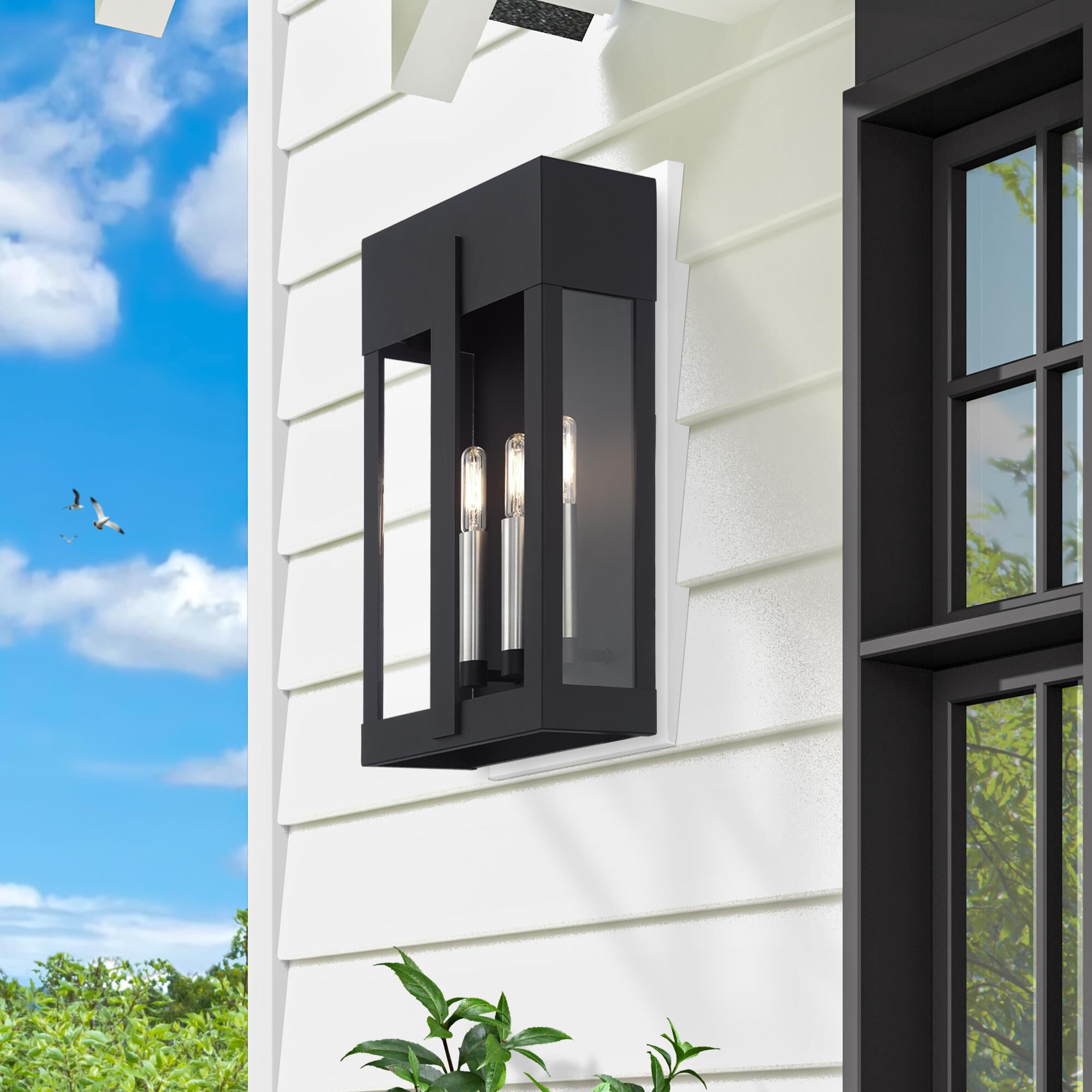 Shown in Black with Brushed Nickel Candles finish and Clear glass