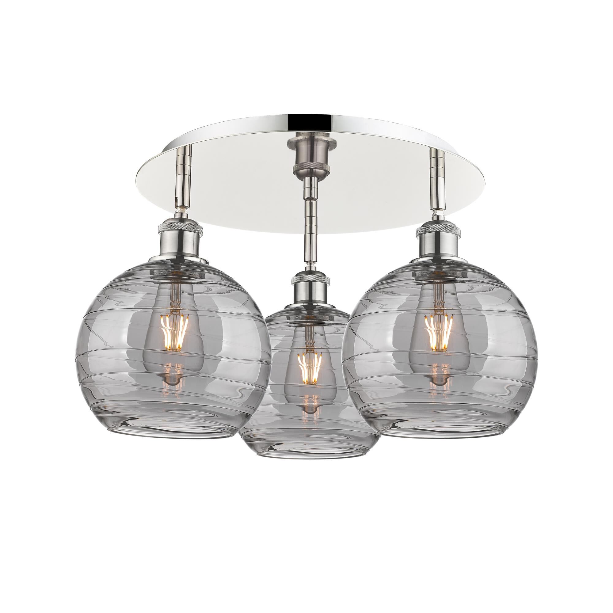 Shown in Polished Nickel finish and Light Smoke Deco Swirl glass