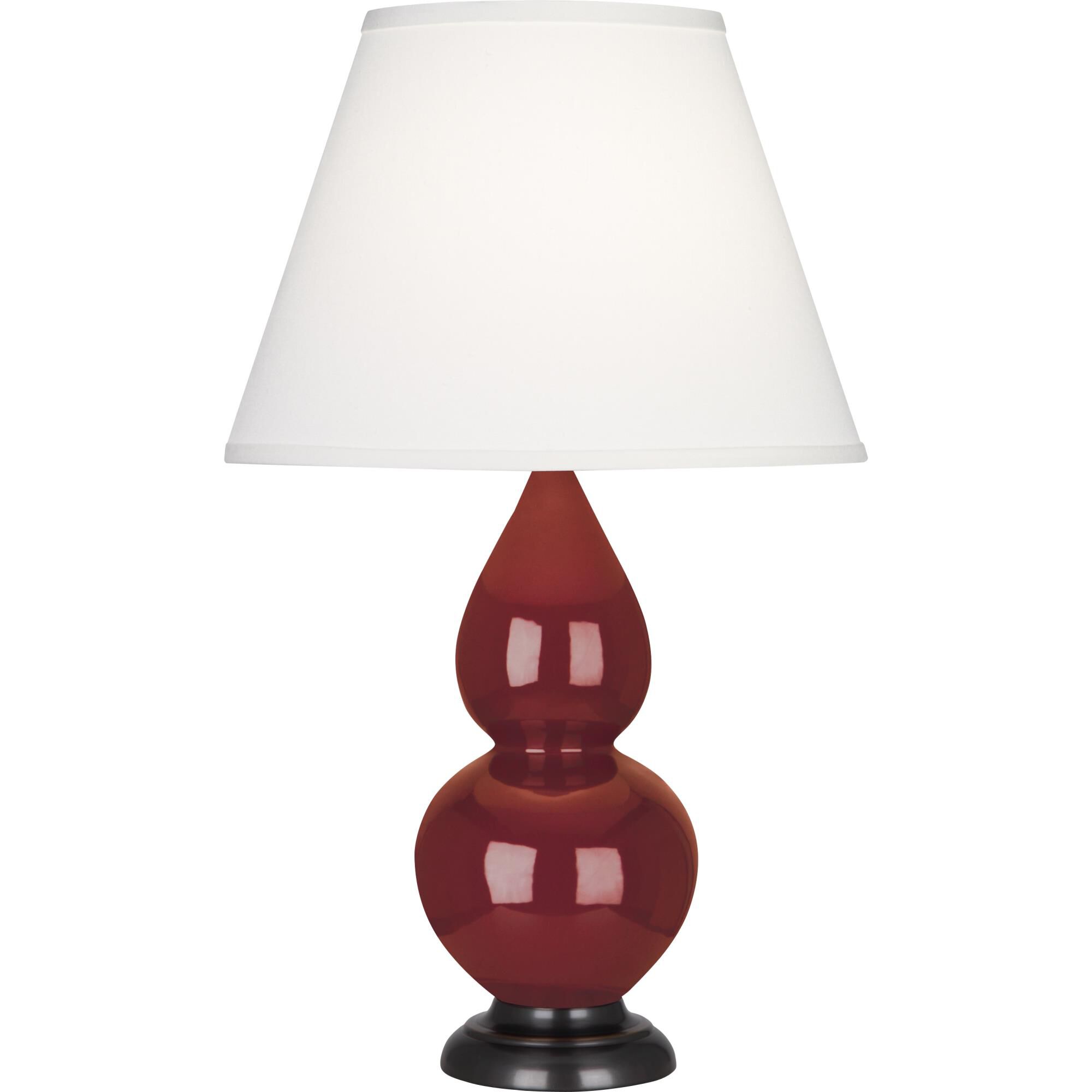 Shown in Oxblood Glazed Ceramic With Deep Patina Bronze ed Accents finish and Pearl Dupioni Fabric shade