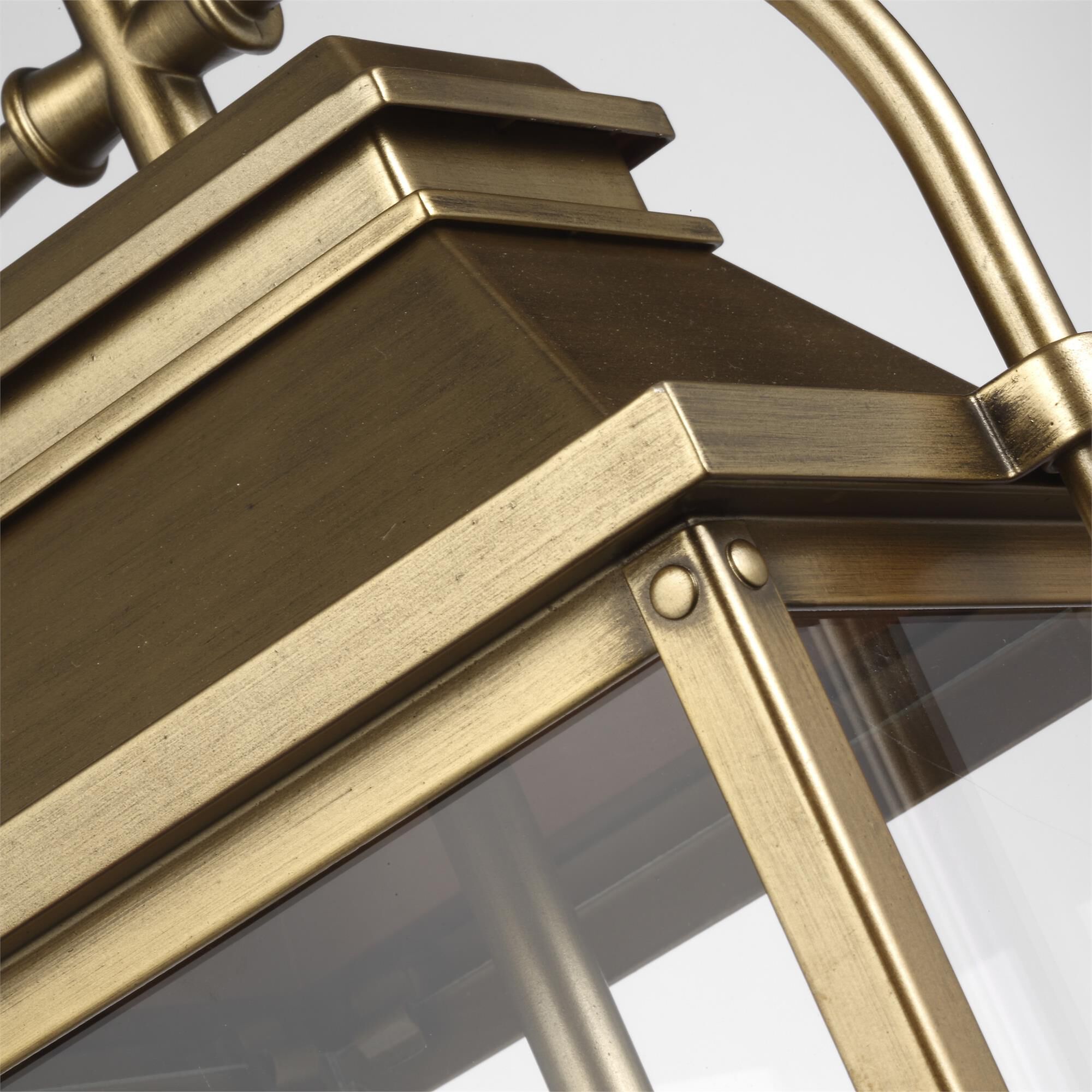 Shown in Painted Distressed Brass finish and Clear Panels glass