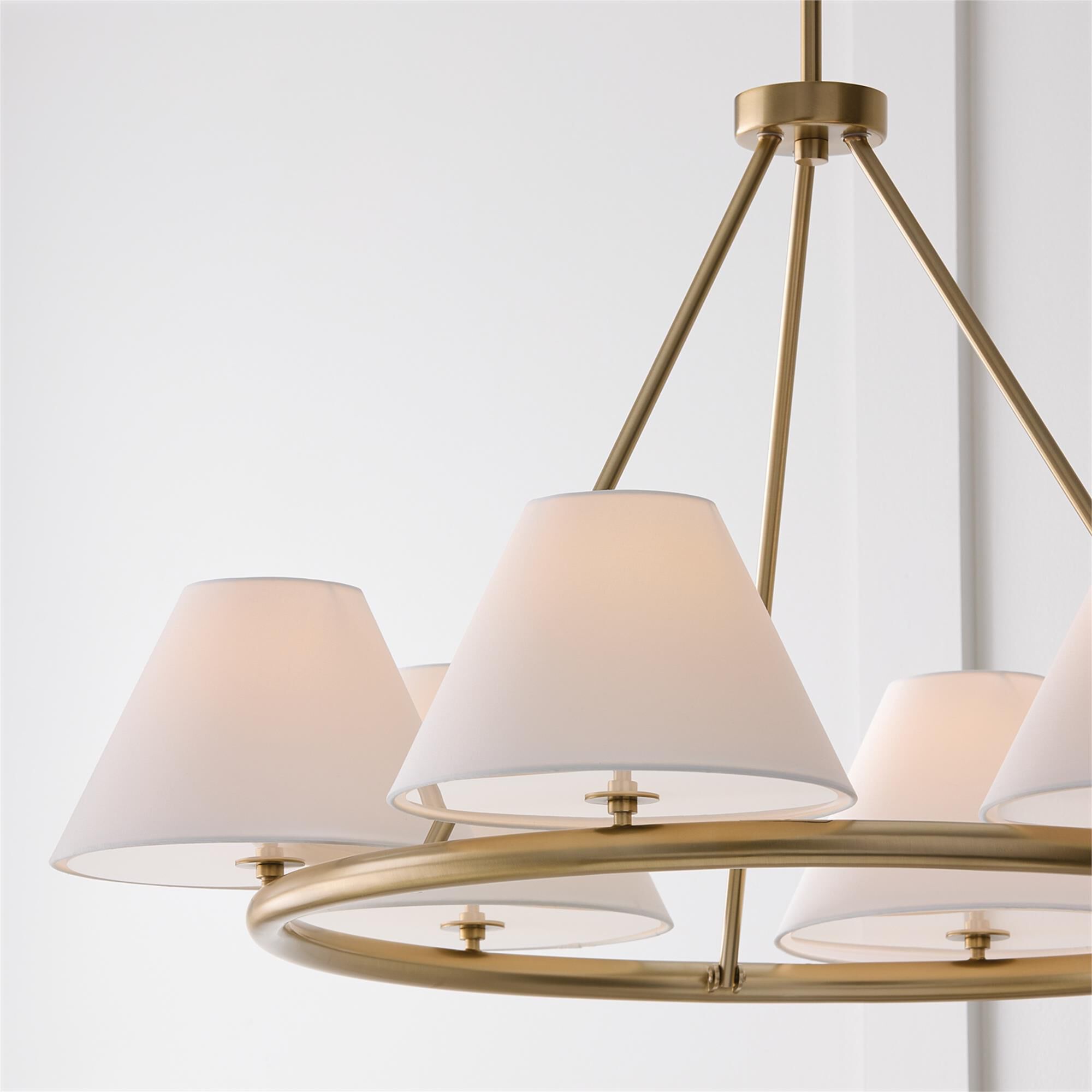 Shown in Matte Brass finish and Soft White Fabric Stay-Straight shade