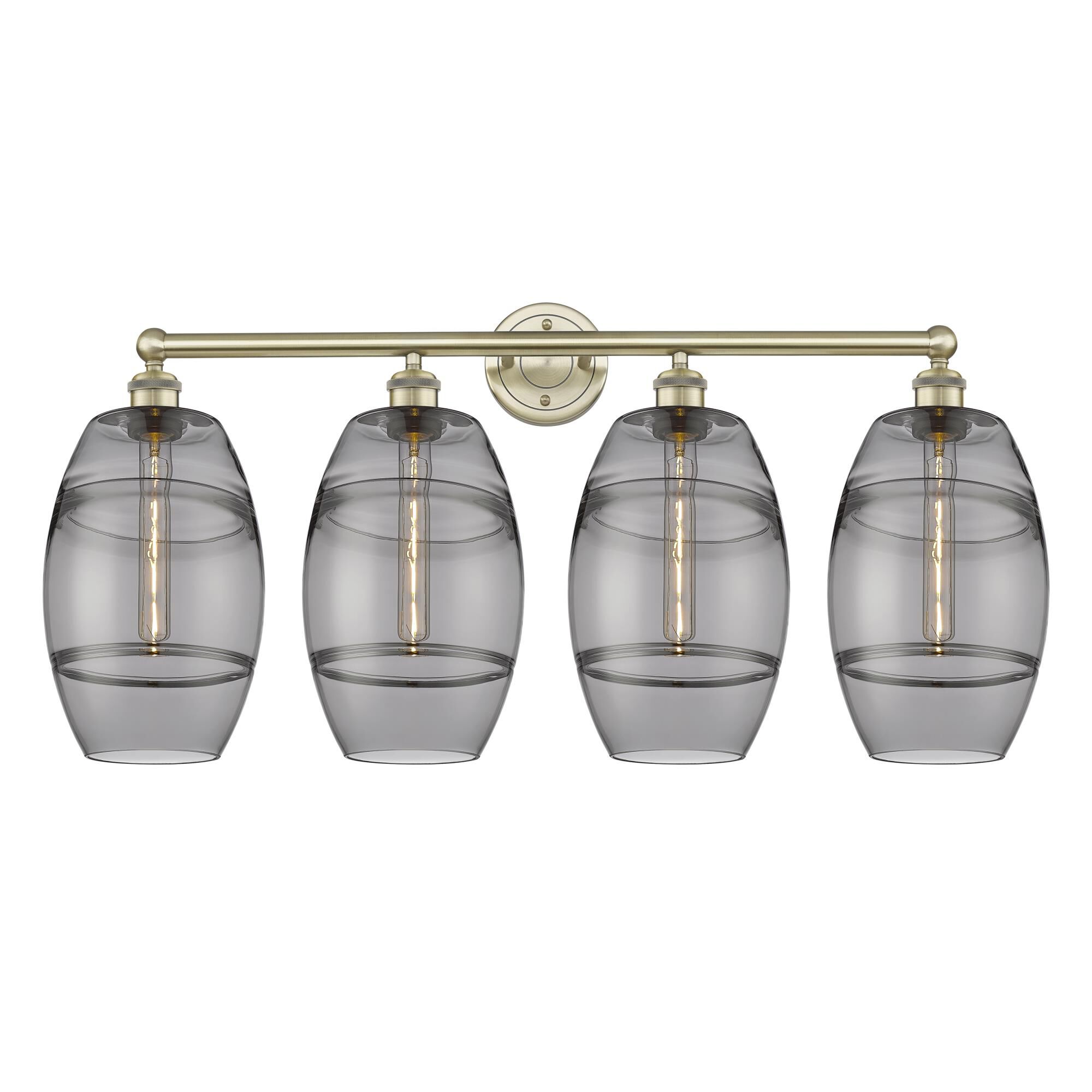 Shown in Antique Brass finish and Light Smoke glass