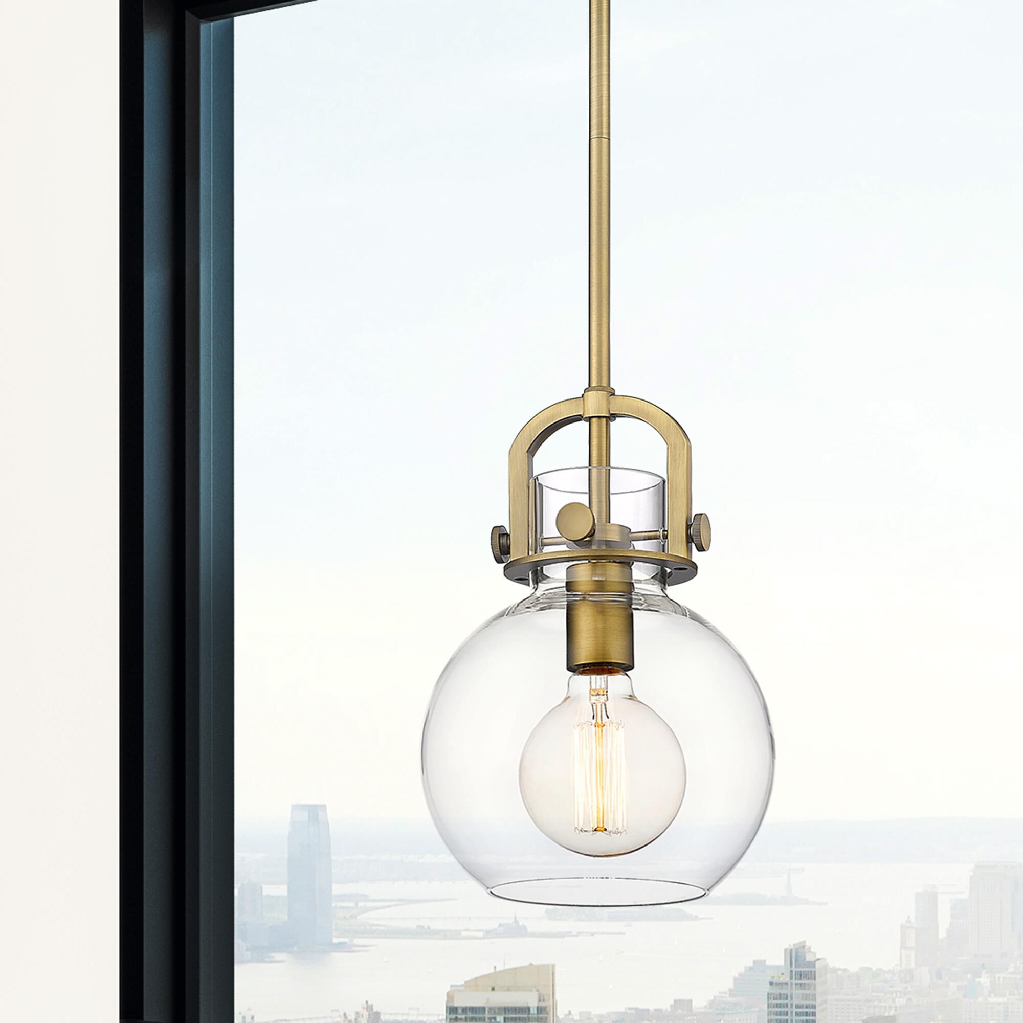 Shown in Brushed Brass finish and Clear glass