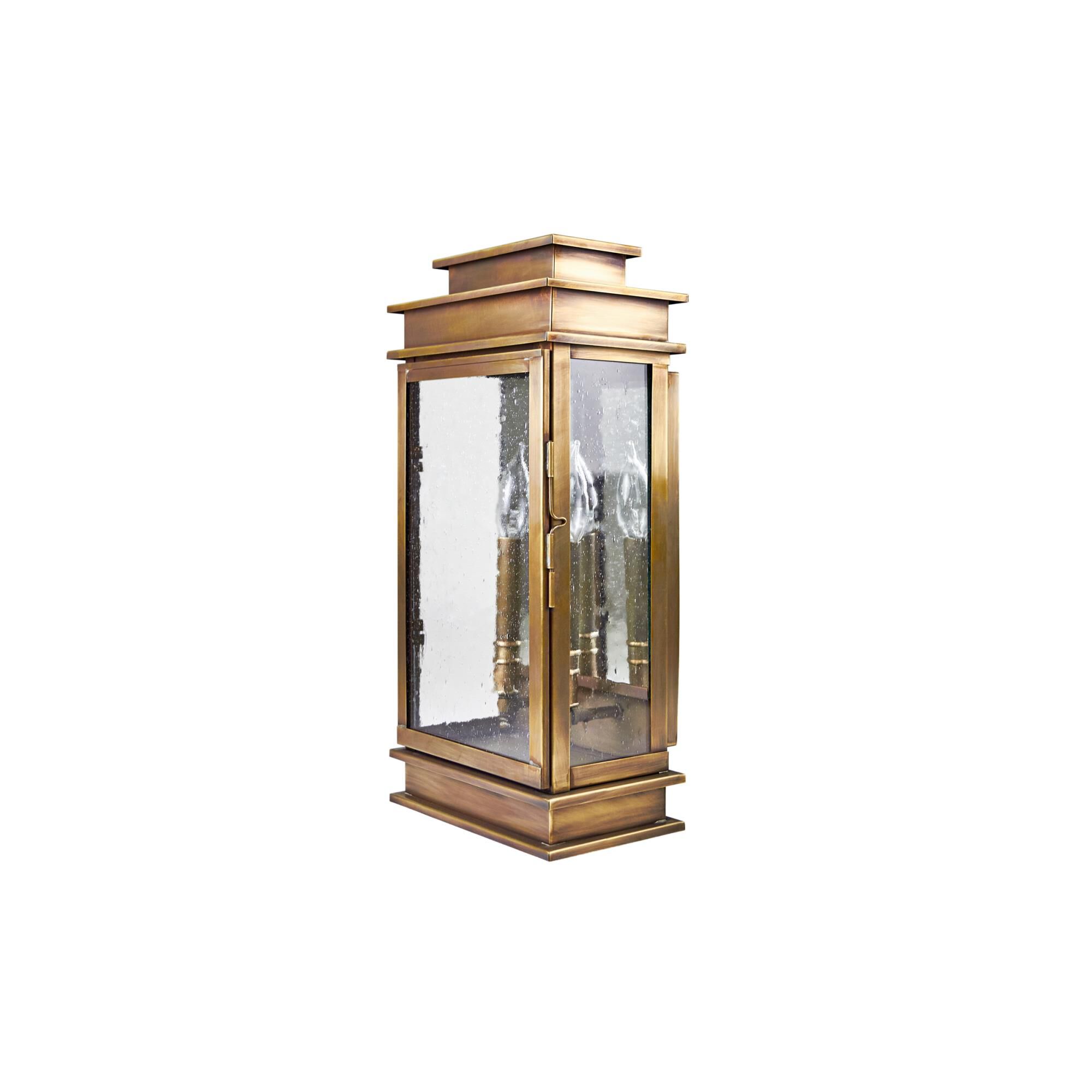 Shown in Antique Brass finish and Clear Seedy glass and No Mirror accent