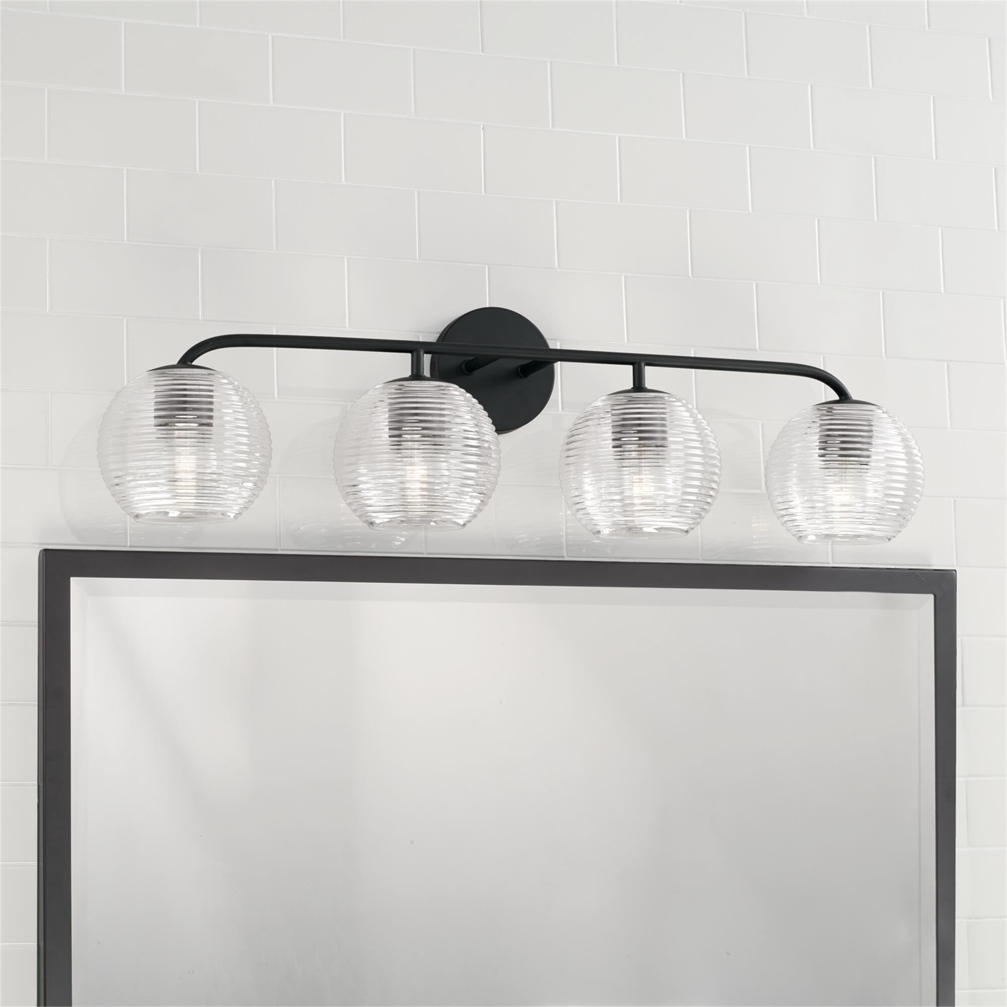 Shown in Matte Black finish and Clear Ribbed glass