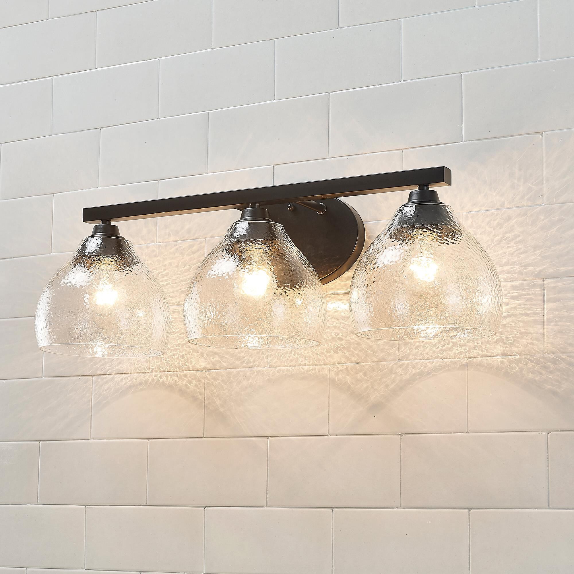 Shown in Matte Black finish and Hammered Clear glass