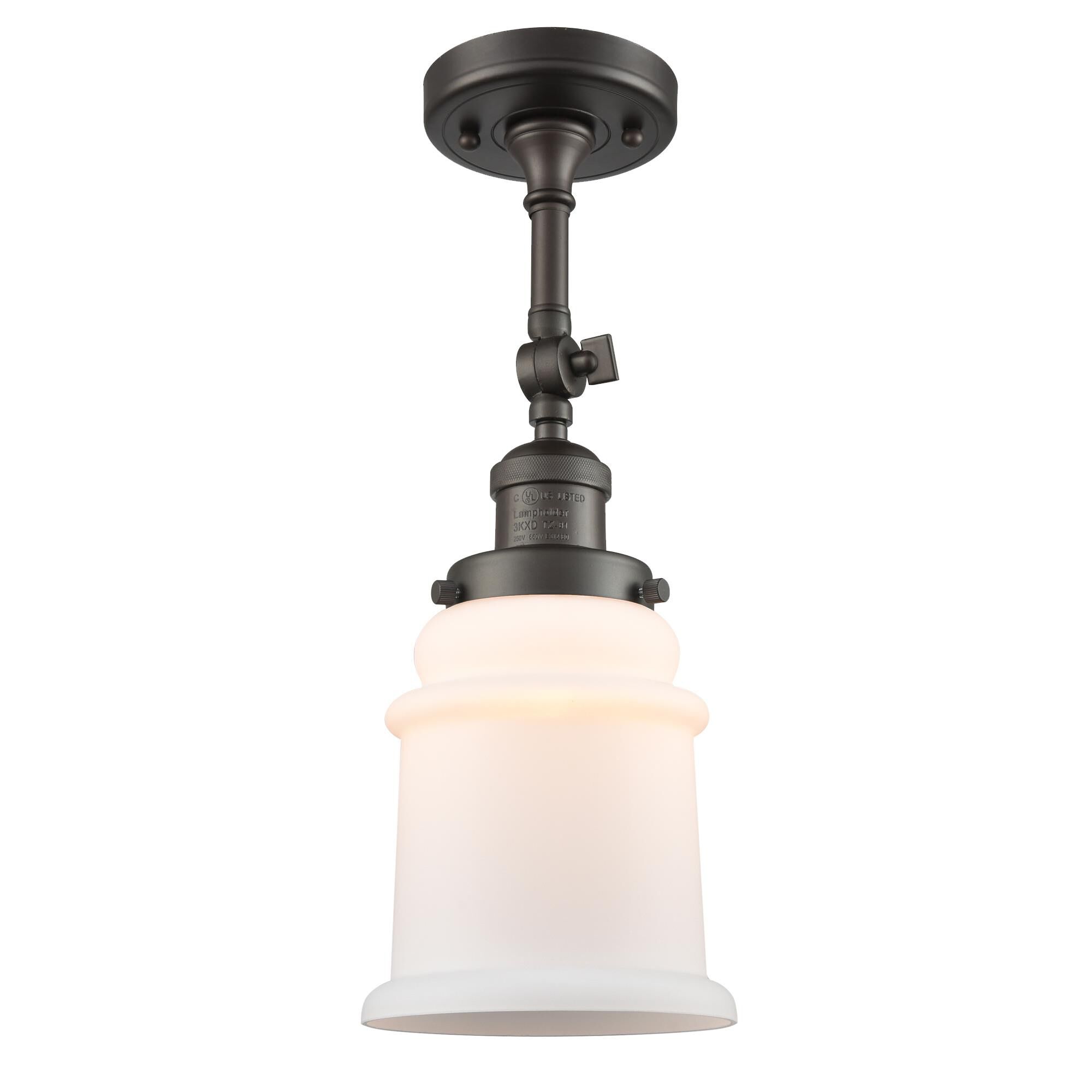 Shown in Oil Rubbed Bronze finish and Frosted glass and None accent