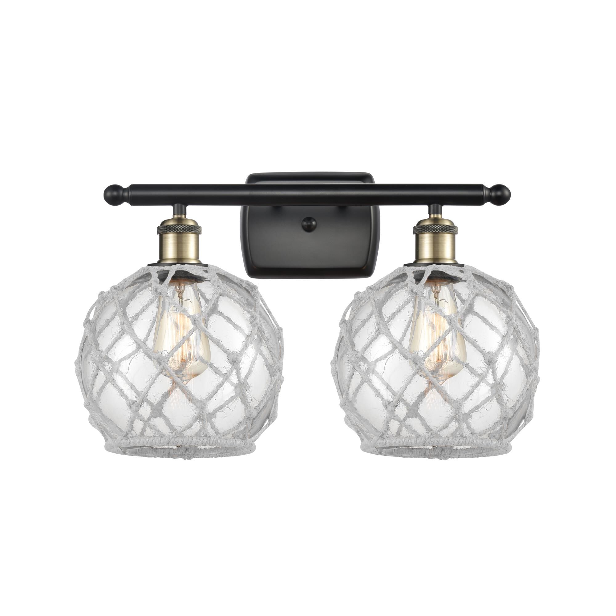 Shown in Black Antique Brass finish and Sphere glass and Glass And Rope shade