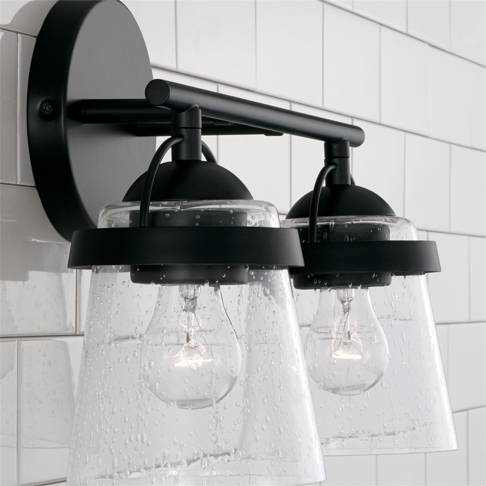 Shown in Matte Black finish and Clear Seeded glass