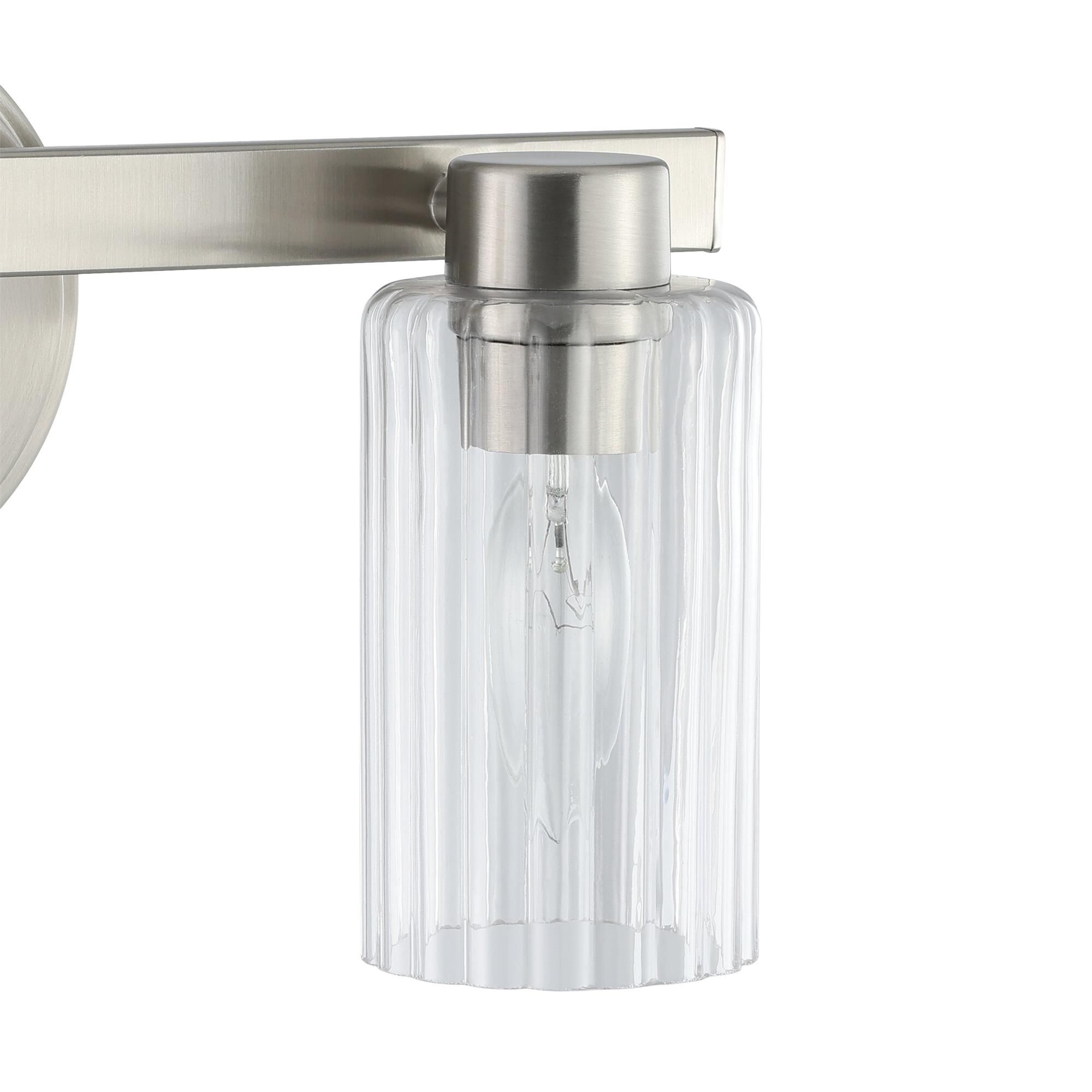 Shown in Brushed Nickel finish and Clear Ribbed glass