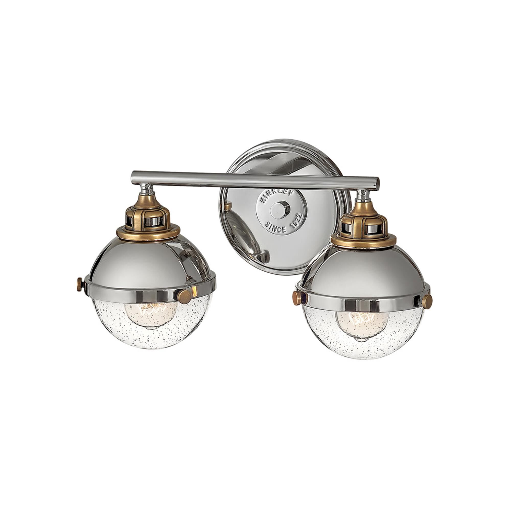 Shown in Polished Nickel finish and Clear Seedy glass and Heritage Brass accent