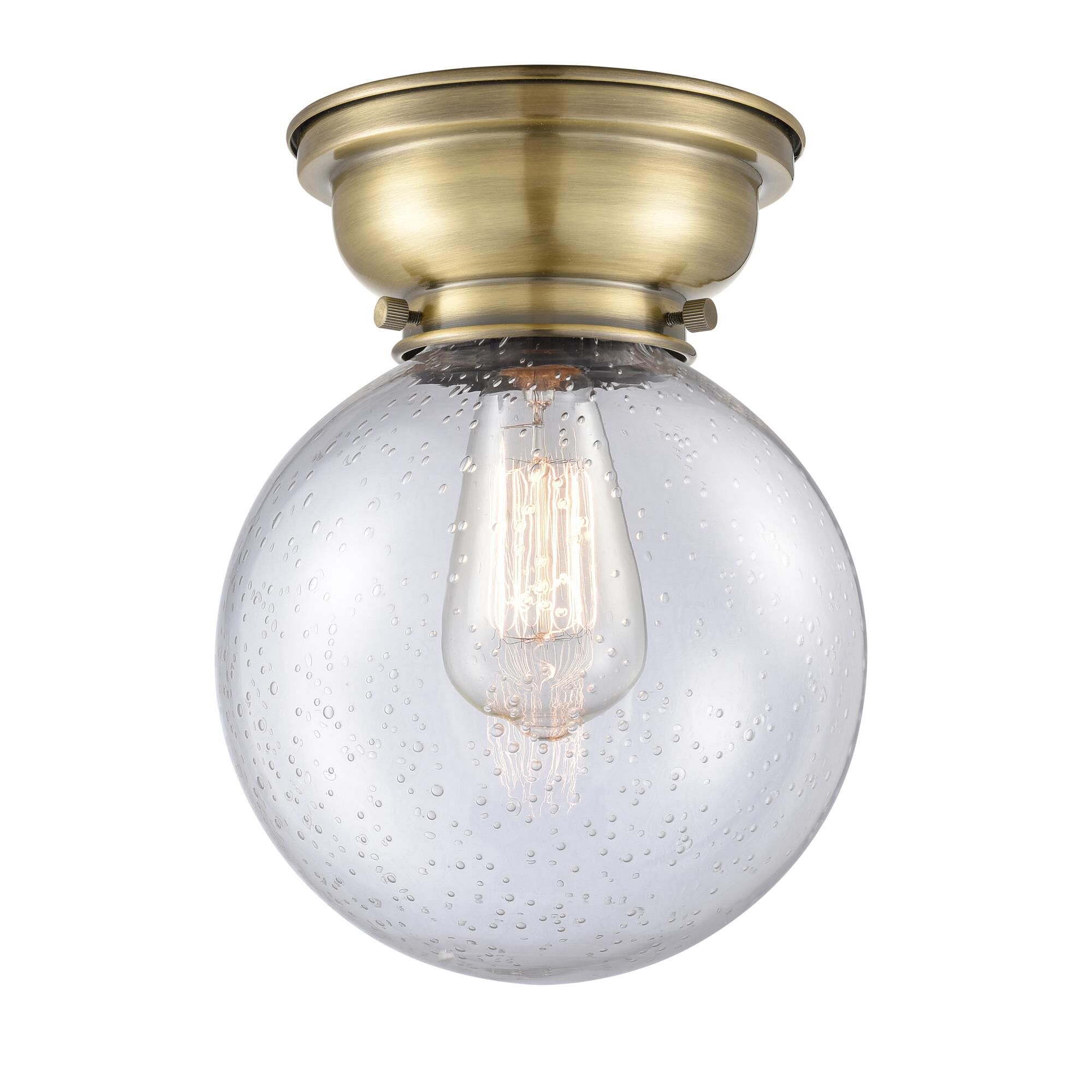 Shown in Antique Brass finish and Globe glass and Glass shade