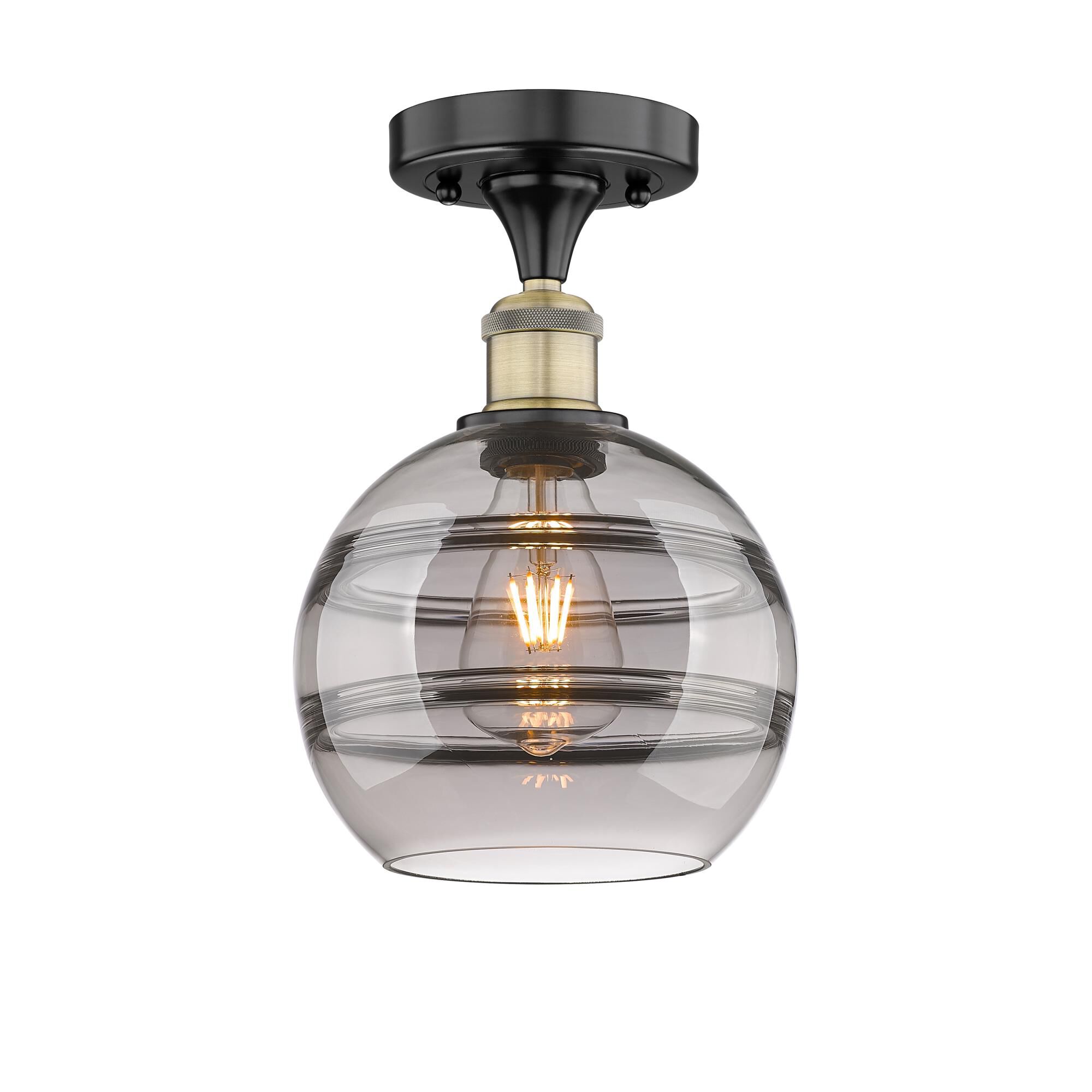 Shown in Black Antique Brass finish and Light Smoke glass