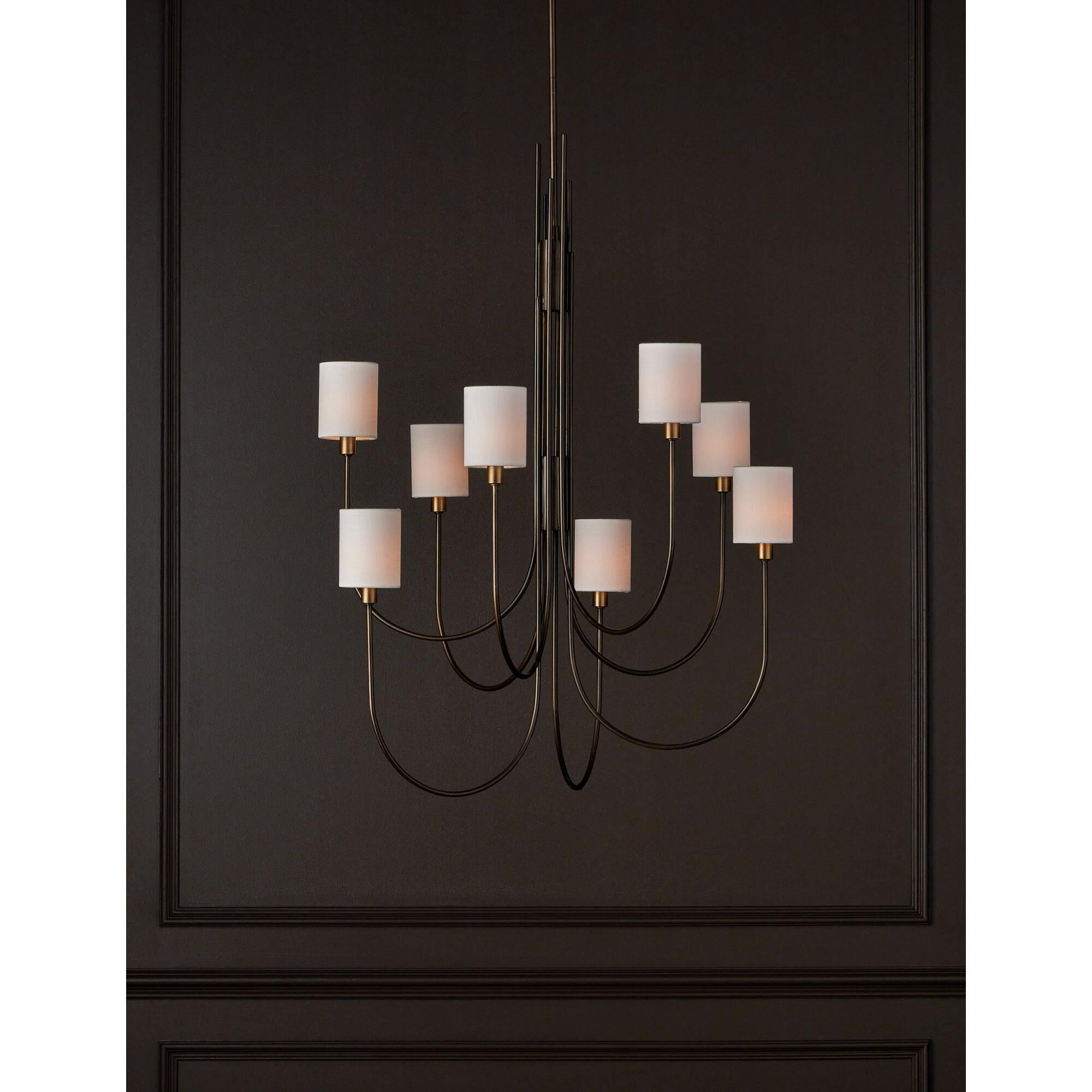 Shown in Statuary Bronze and Antique Brass finish and Off White Linen shade