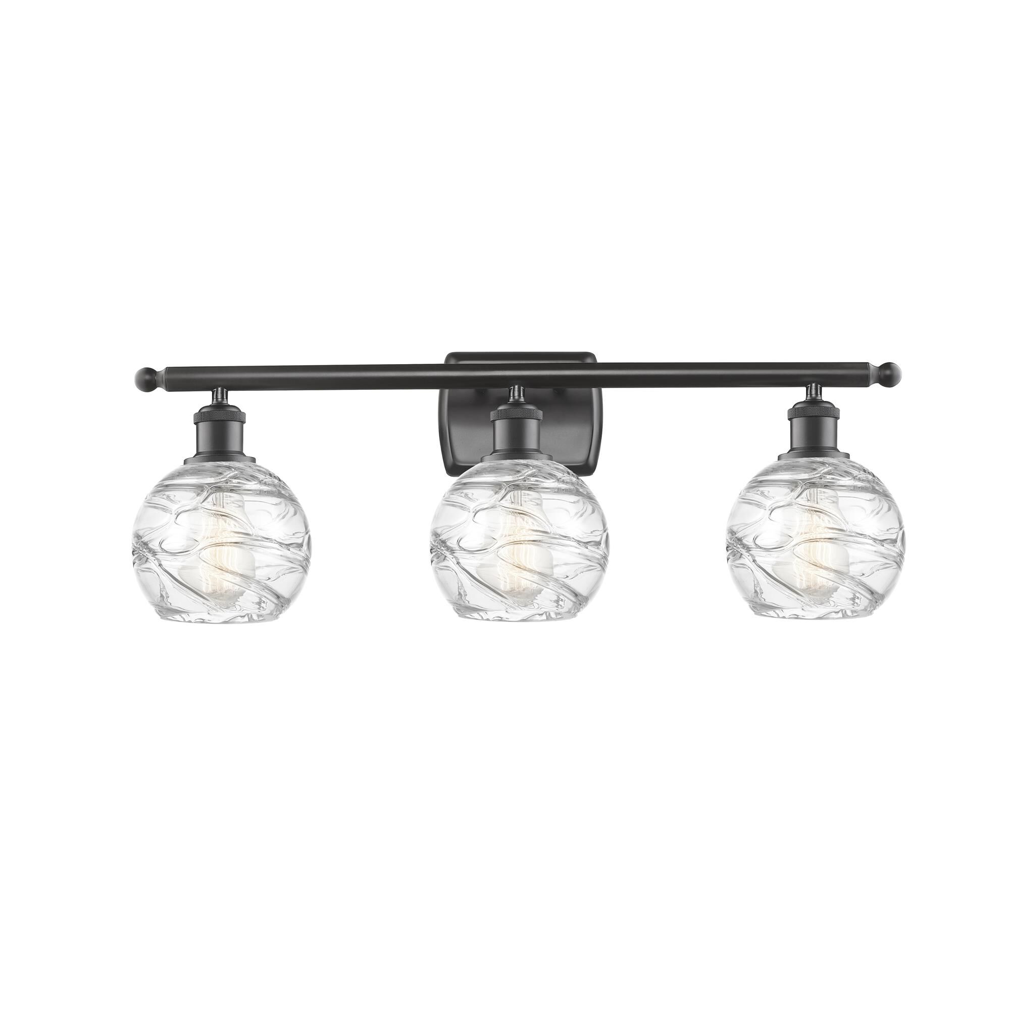 Shown in Oil Rubbed Bronze finish and Clear Deco Swirl glass